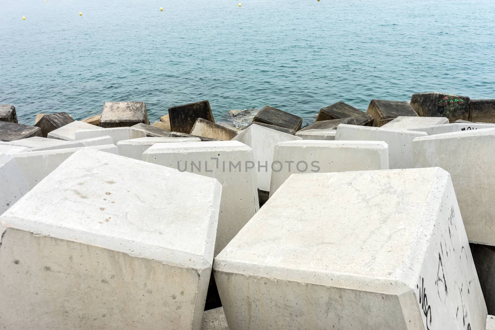 Stone along the Malagueta beach in Malaga, Spain, Europe  by ramana16