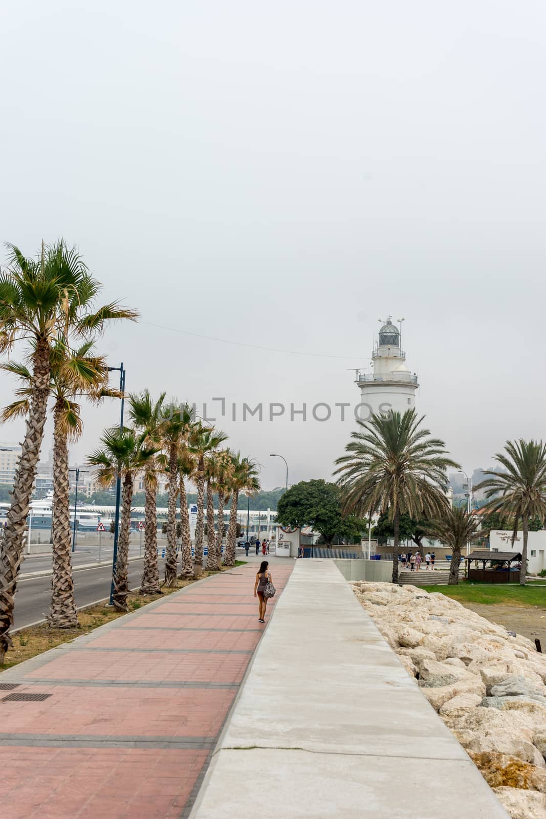 The lighthouse at Malagueta beach in Malaga, Spain, Europe  by ramana16