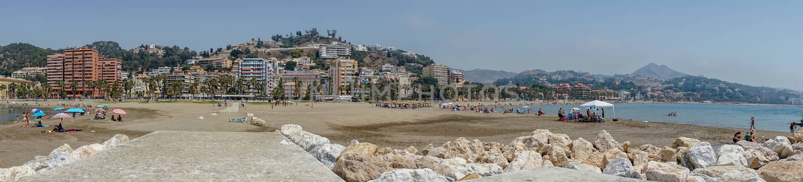 Panoramic view of the ocean at Malagueta beach with rocks at Mal by ramana16