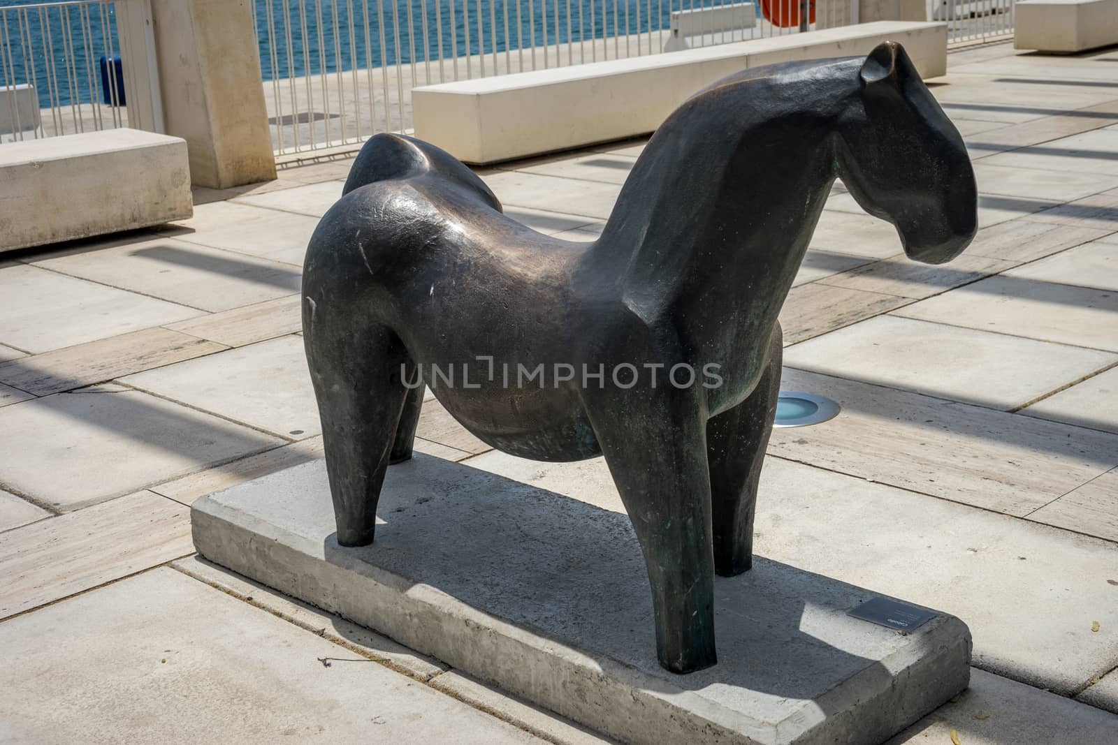 Sculpture of a stone horse at the malagueta beach at Malaga, Spa by ramana16