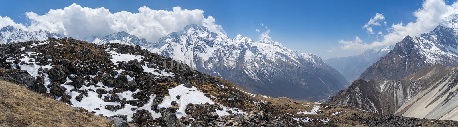 Trekking in Himalaya mountains with snow peaks