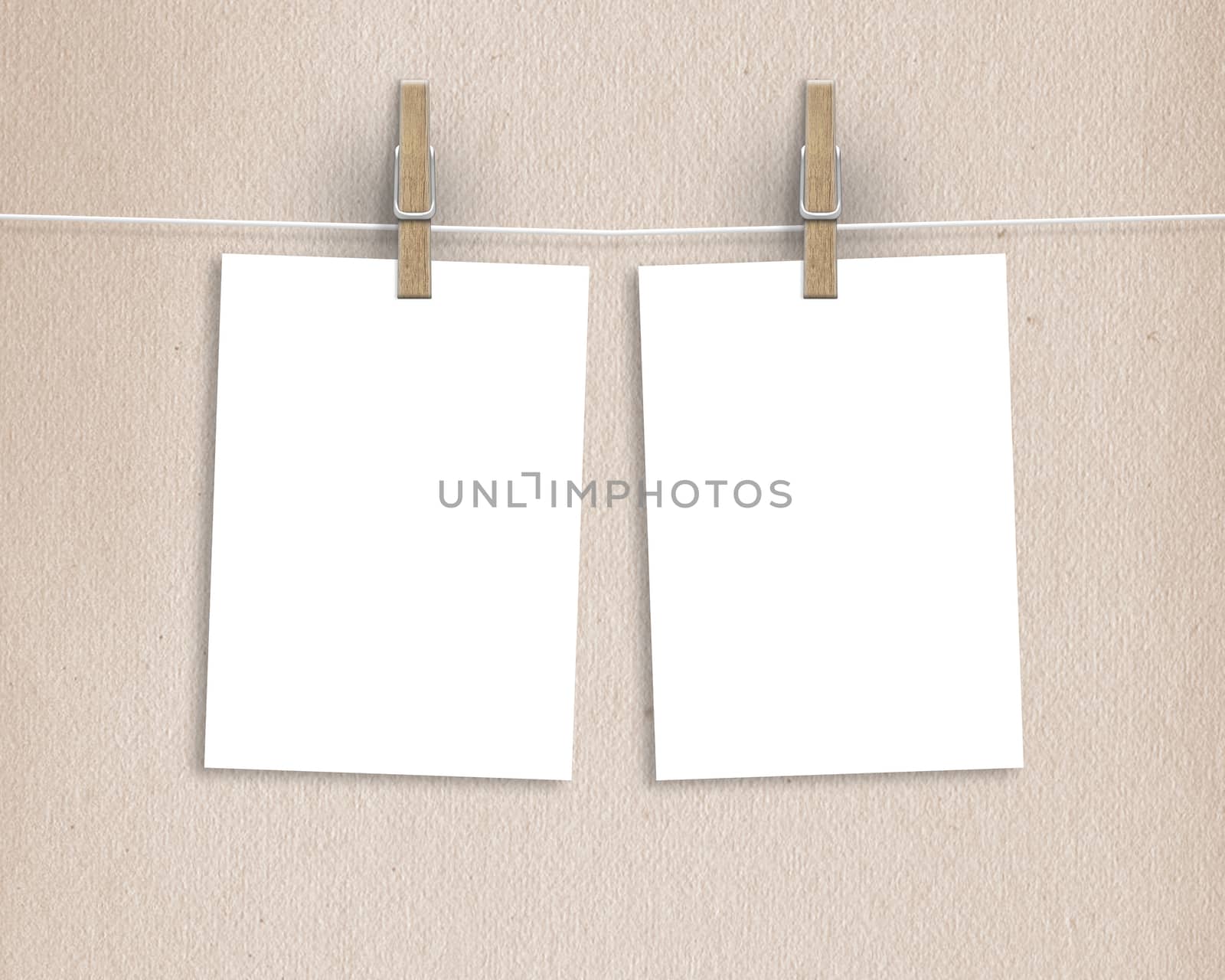 Paper cards hanging on a clothesline with clothespins on light background by boys1983@mail.ru