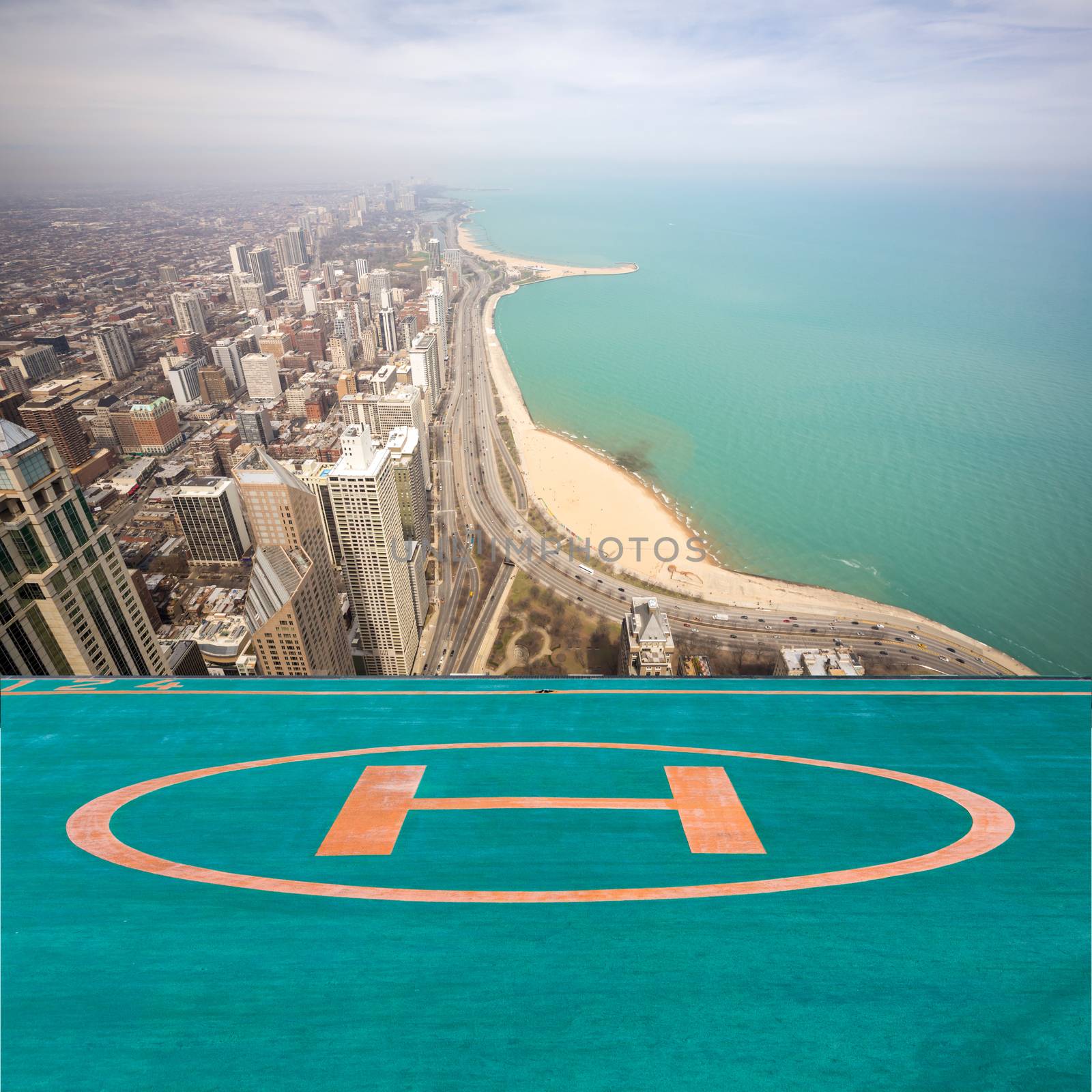 Aerial view of Chicago city and Lake Michigan with helipad airport