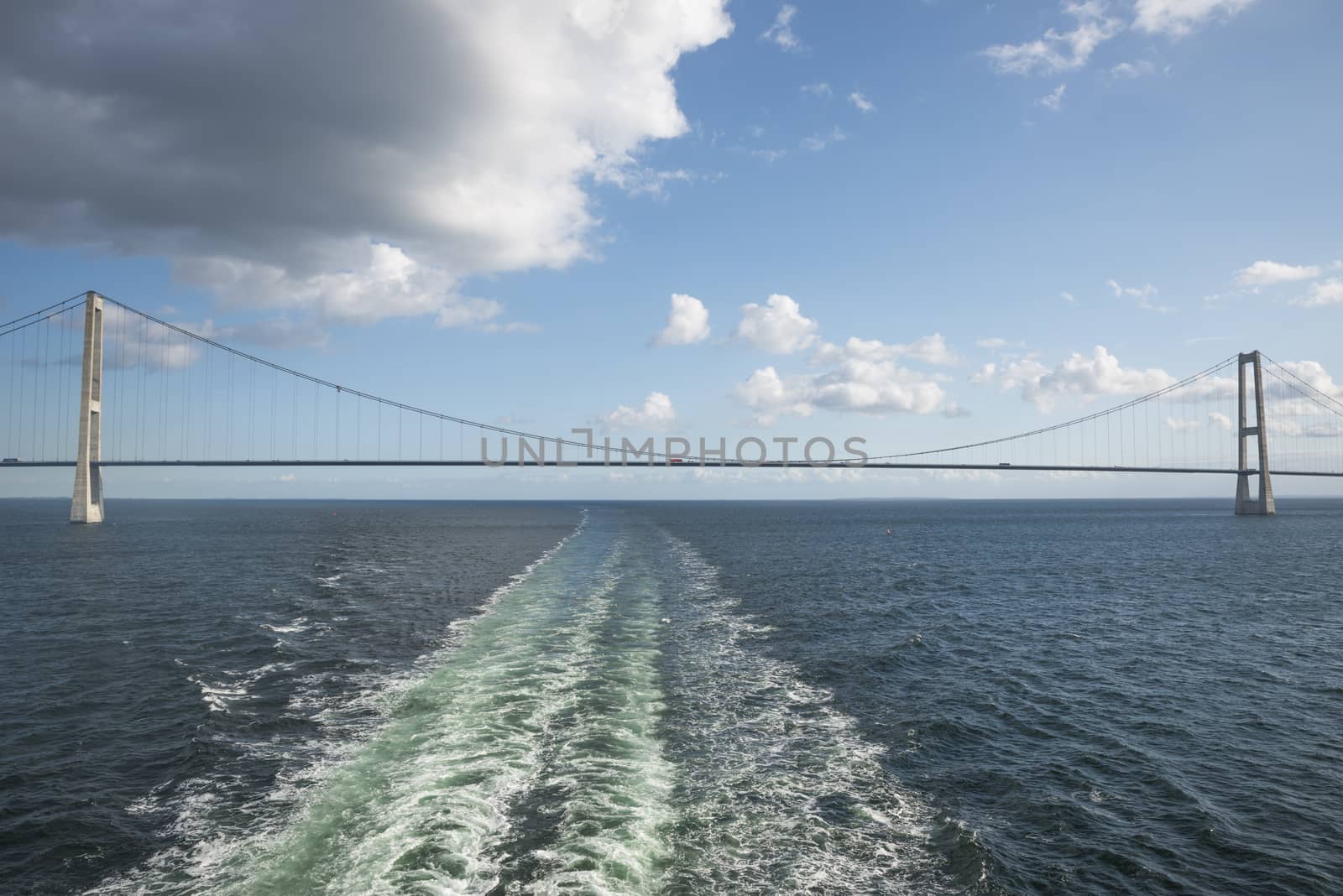 crossing the Suspension bridge Great Belt Denmark connecting the Zealand and Funen with a boat