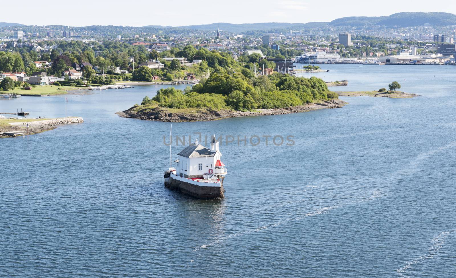 smalli sland with church in the harbor of Oslo norway