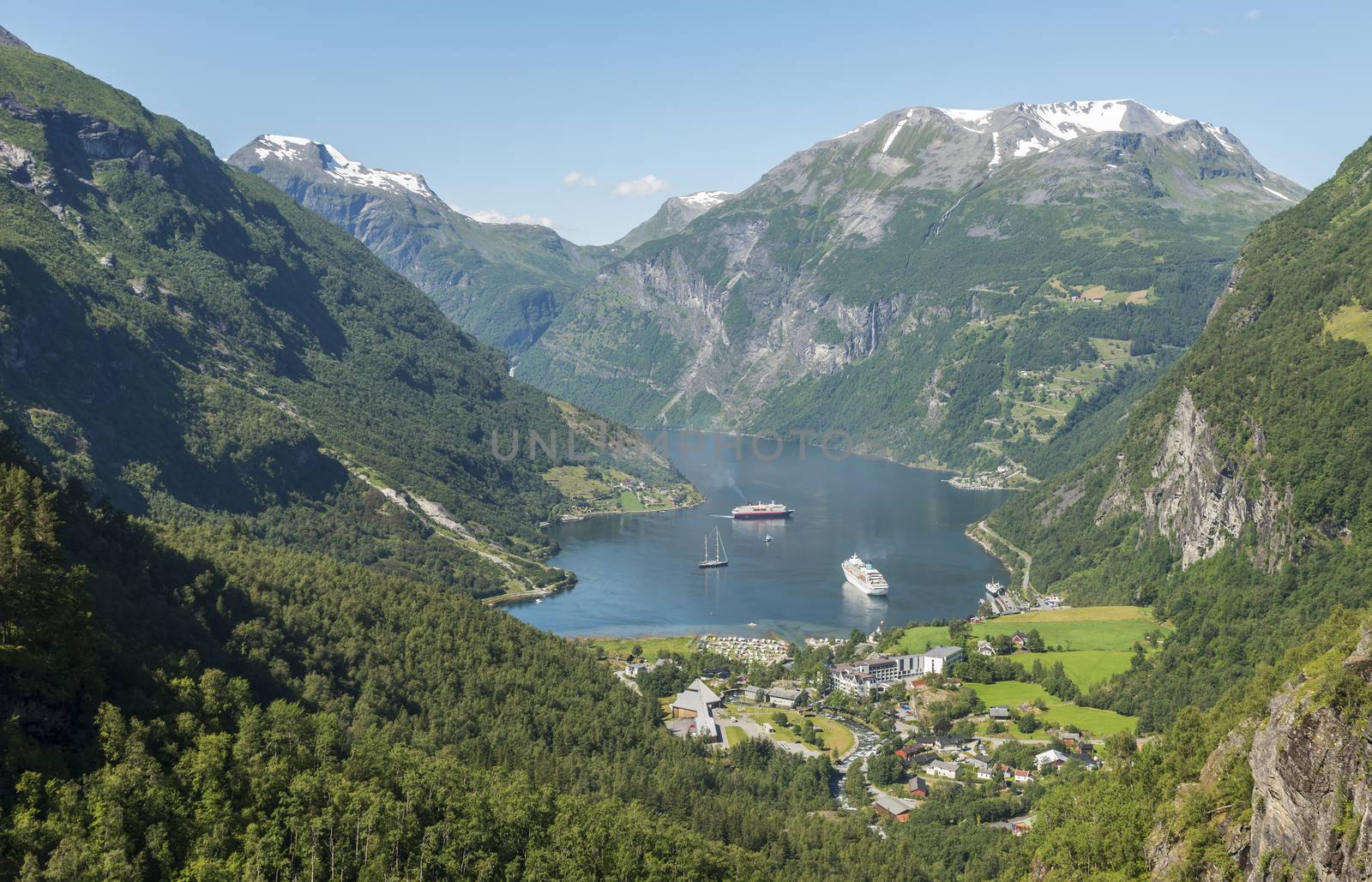 camping sailing boat and cruis ship in the famous geiranger fjord in norway