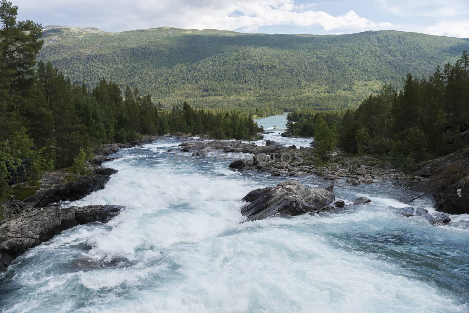 waterfall and rocks in norway near geiranger otta river