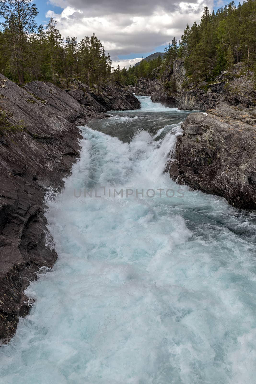 pollfossen waterfall and rocks in norway near geiranger otta river