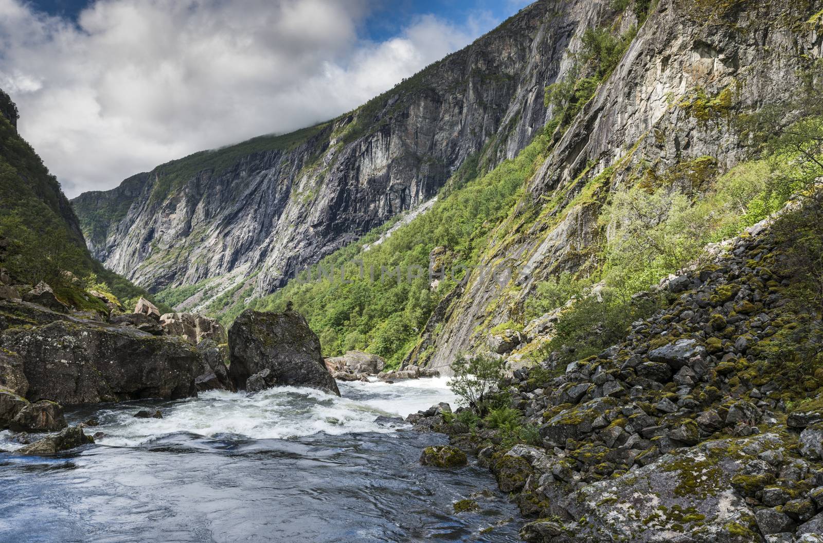 walking track along the river to the voringfossen waterfall by compuinfoto