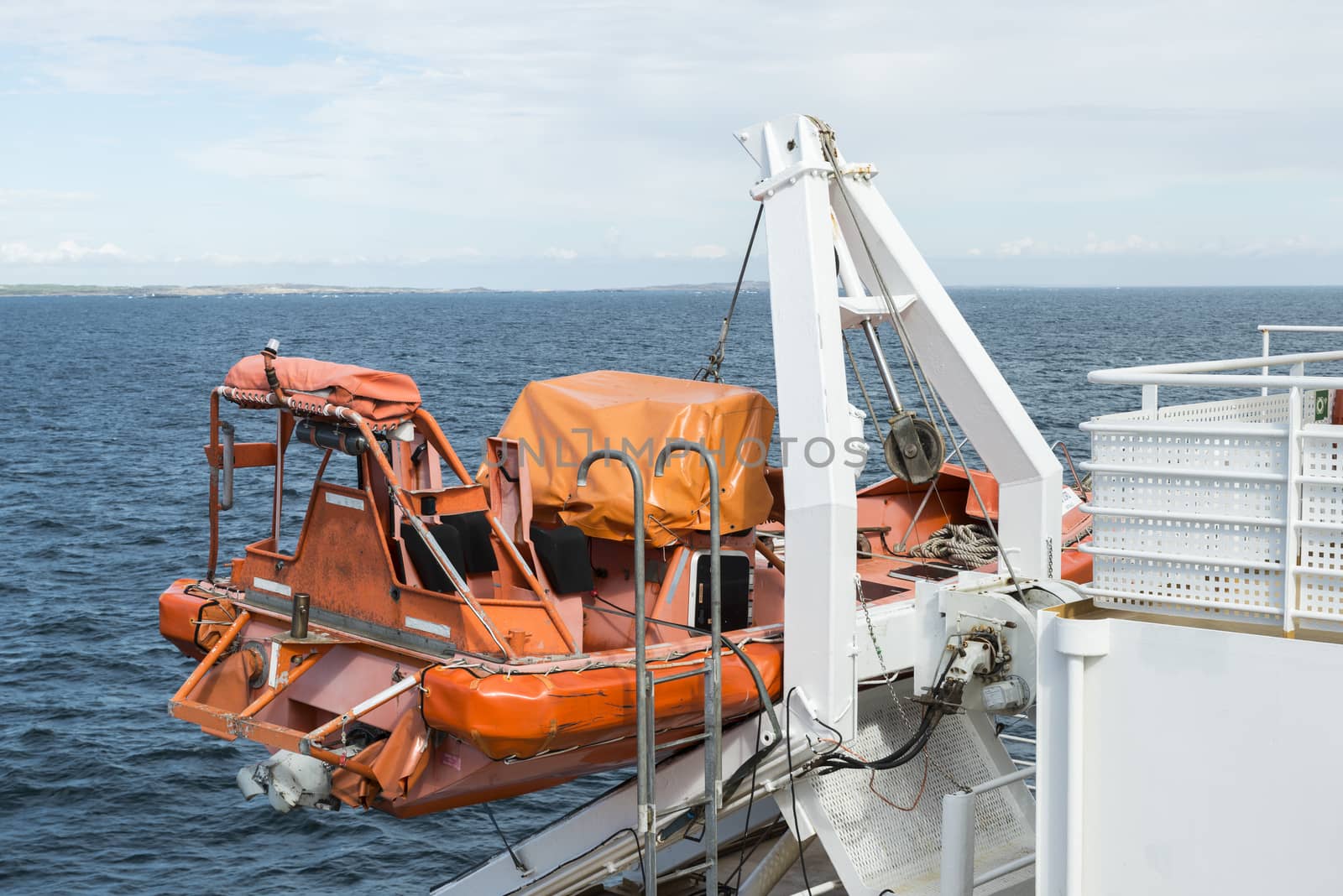 lifeboat on a cruise ship on the sea by compuinfoto