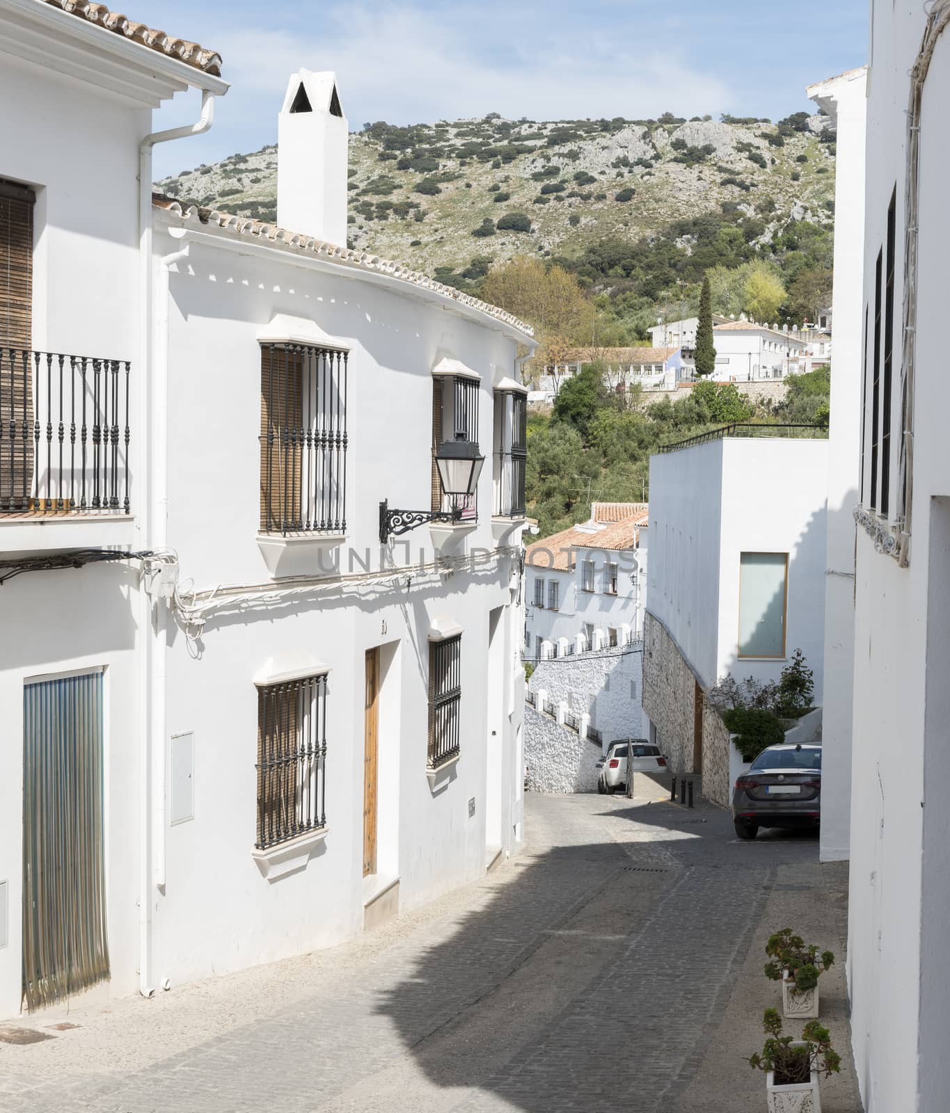 the white city Zuheros in Andalusia in Spain with houses on the mountains