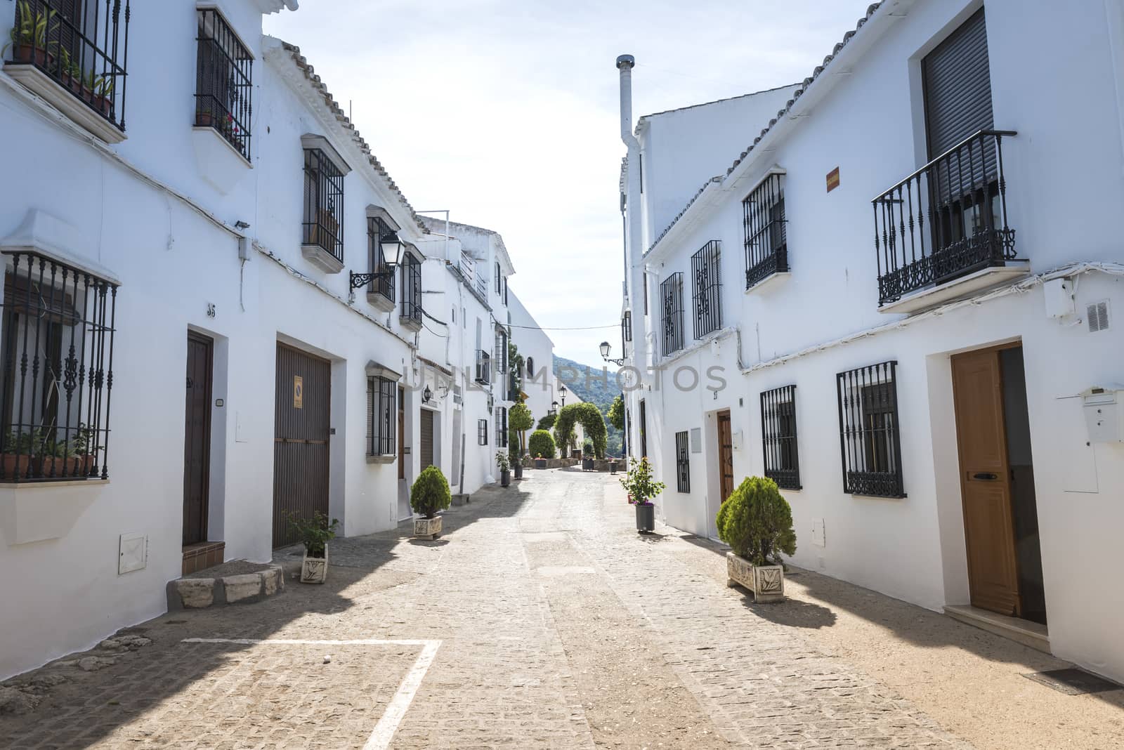 the white city Zuheros in Andalusia in Spain with houses on the mountains