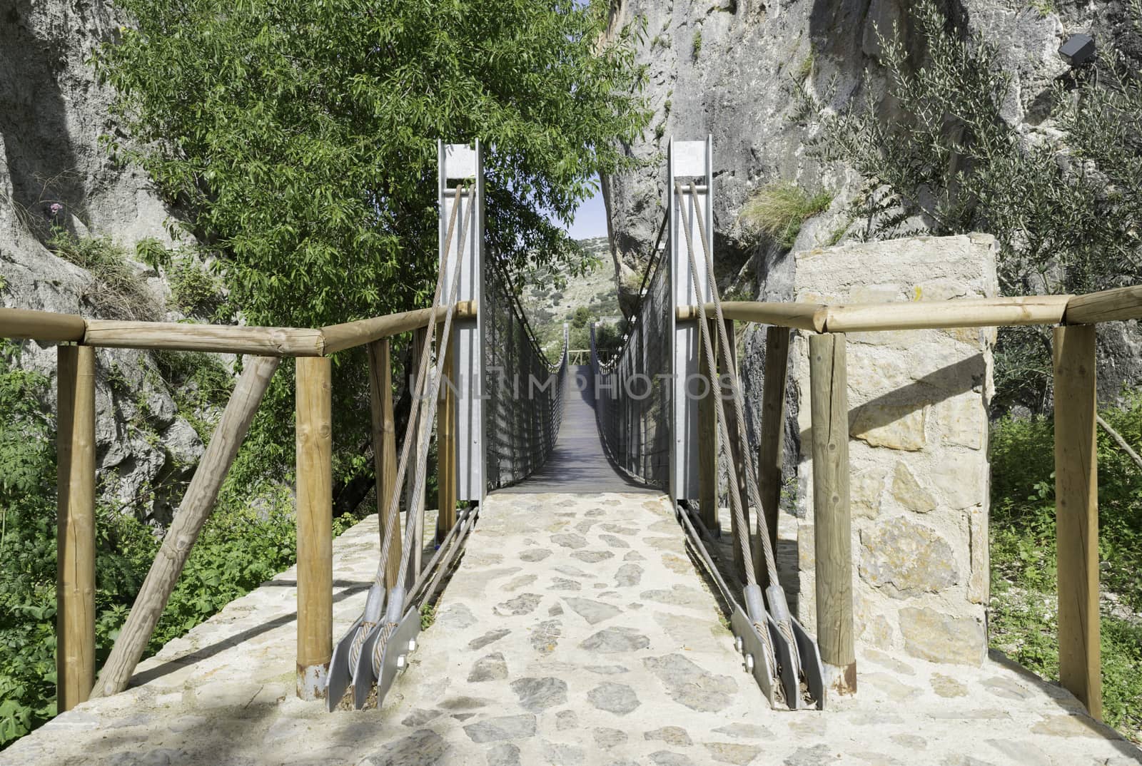 suspension bridge for pedestrians near the castle of zuheros in andalusia
