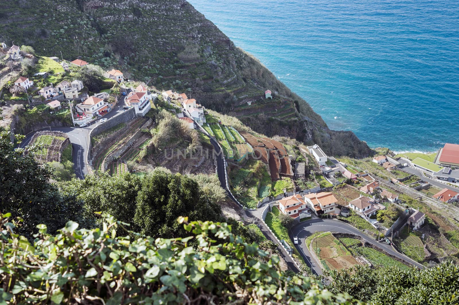 View of the village of Porto Moniz with lava-rock pool, Madeira Island, Portugal