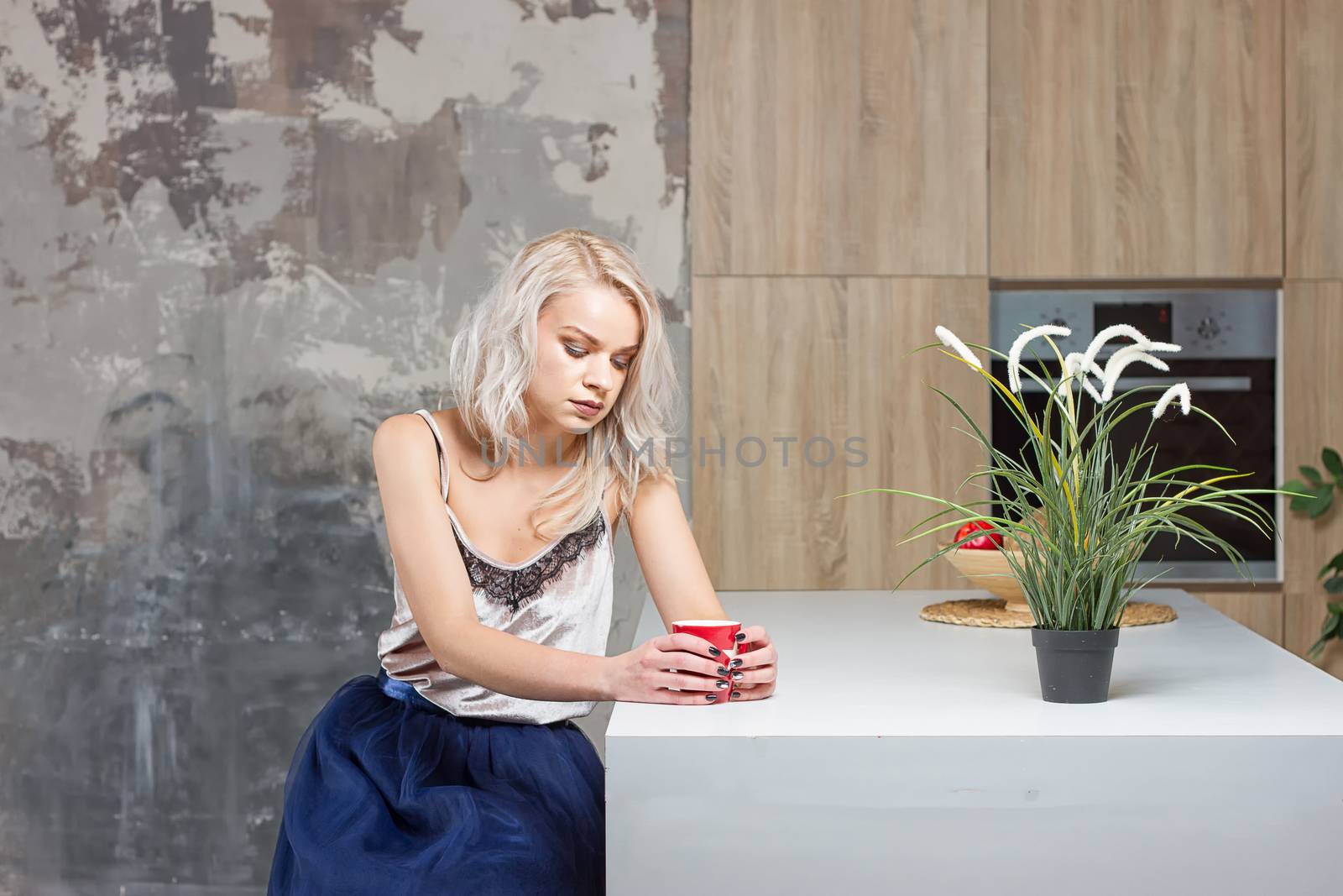 woman drinking coffee in the morning at home