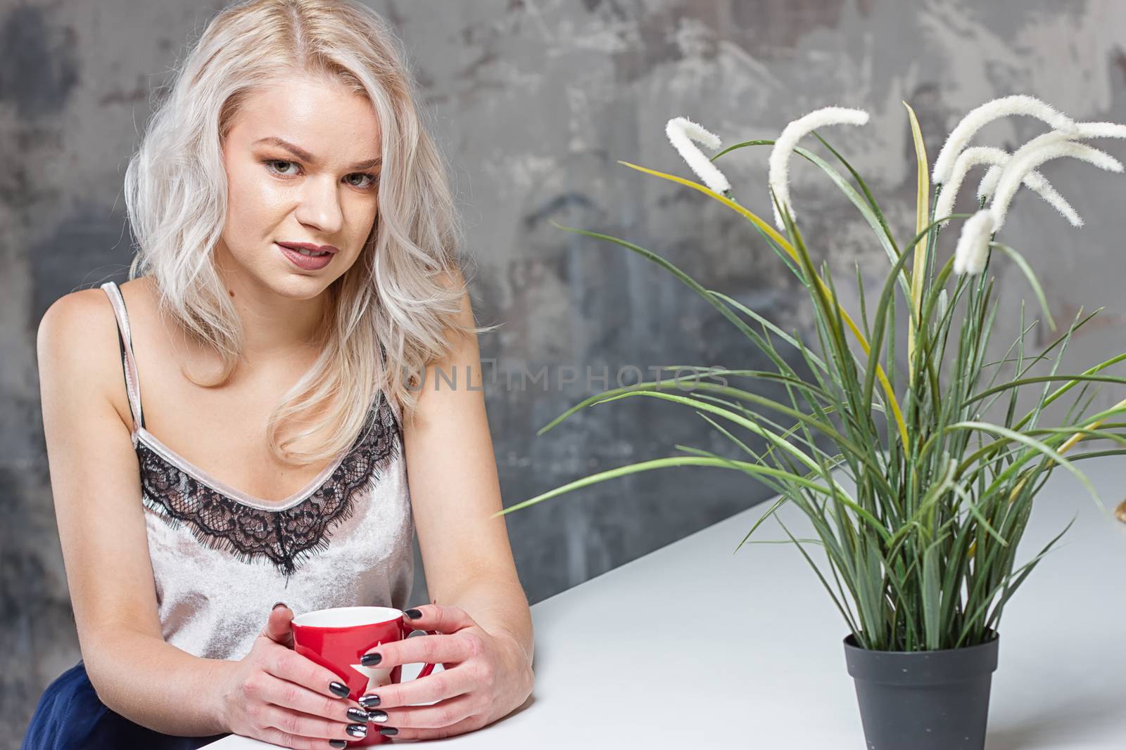 woman drinking coffee in the morning at home