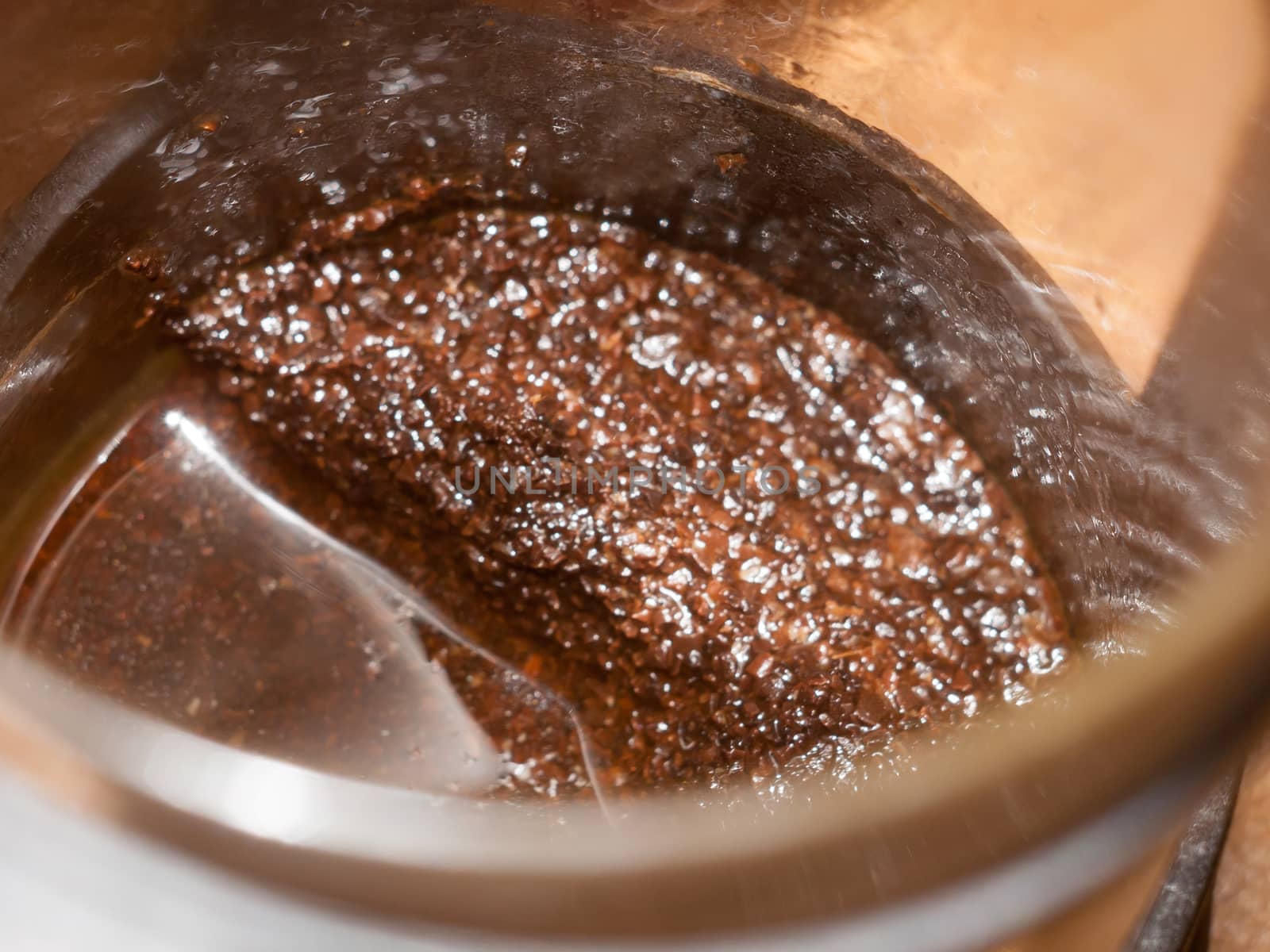 close up of wet coffee grounds in press background texture macro cafe; essex; england; uk