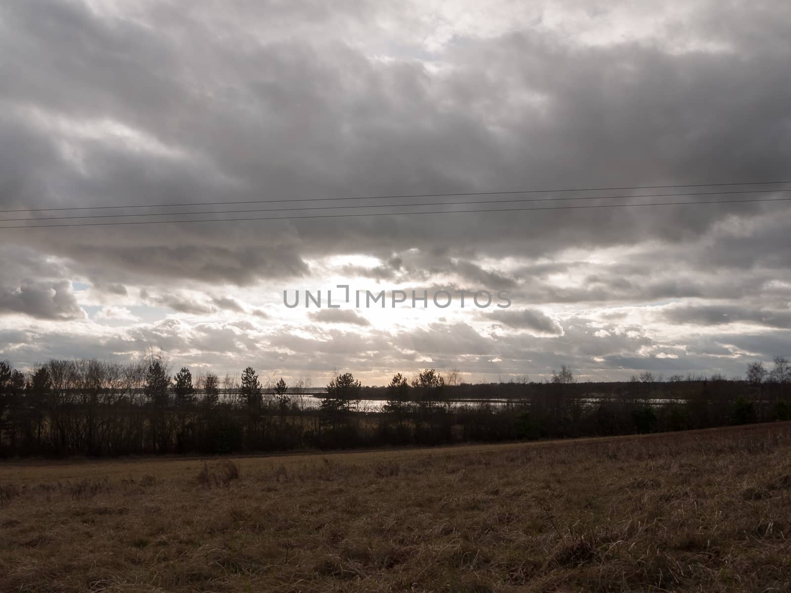 moody skyline clouds over autumn farm field ; essex; england; uk