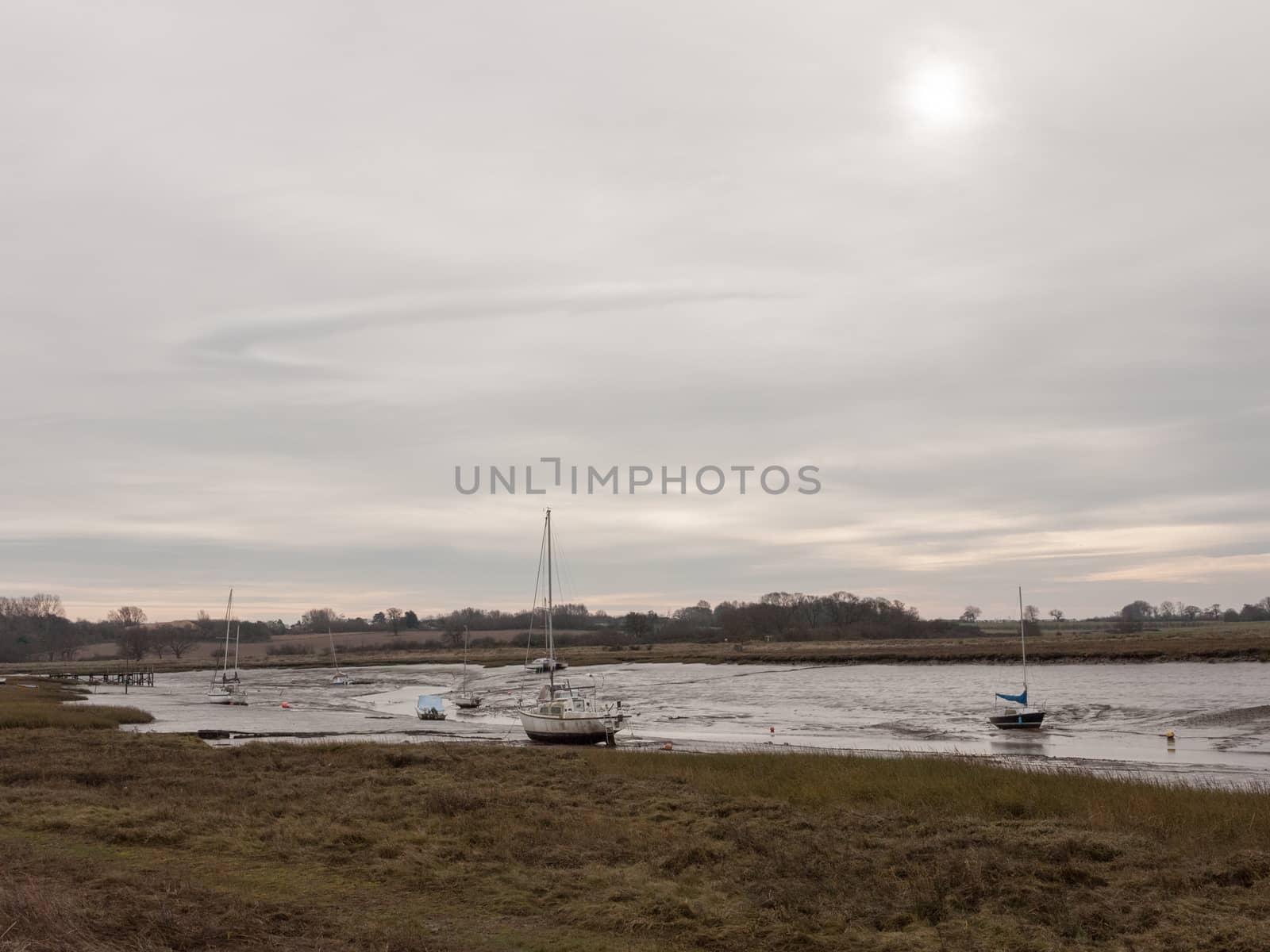 autumn winter dark cloudy overcast harbour scene estuary; essex; england; uk