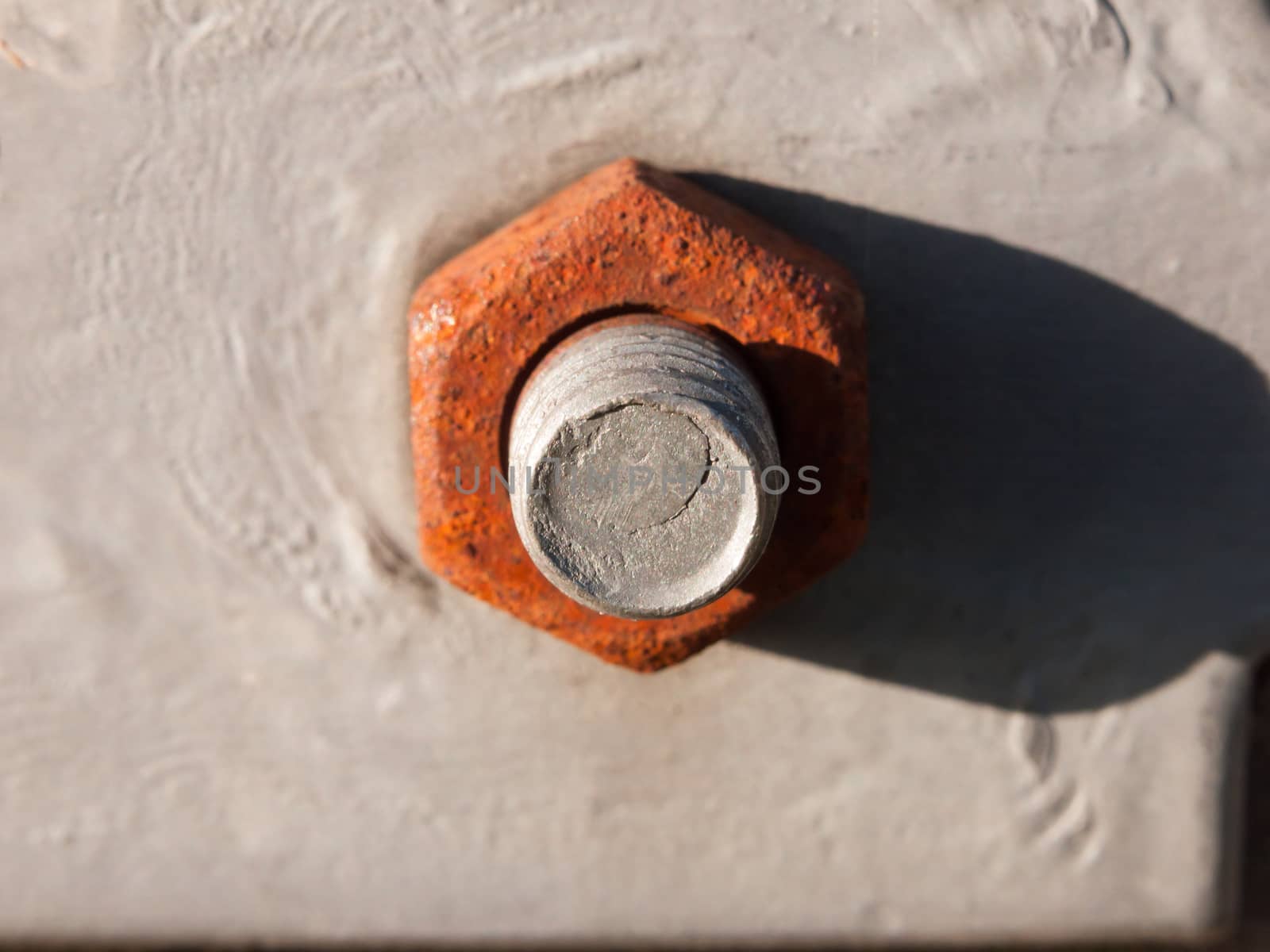 close up of large rusty bolt and screw head; essex; england; uk