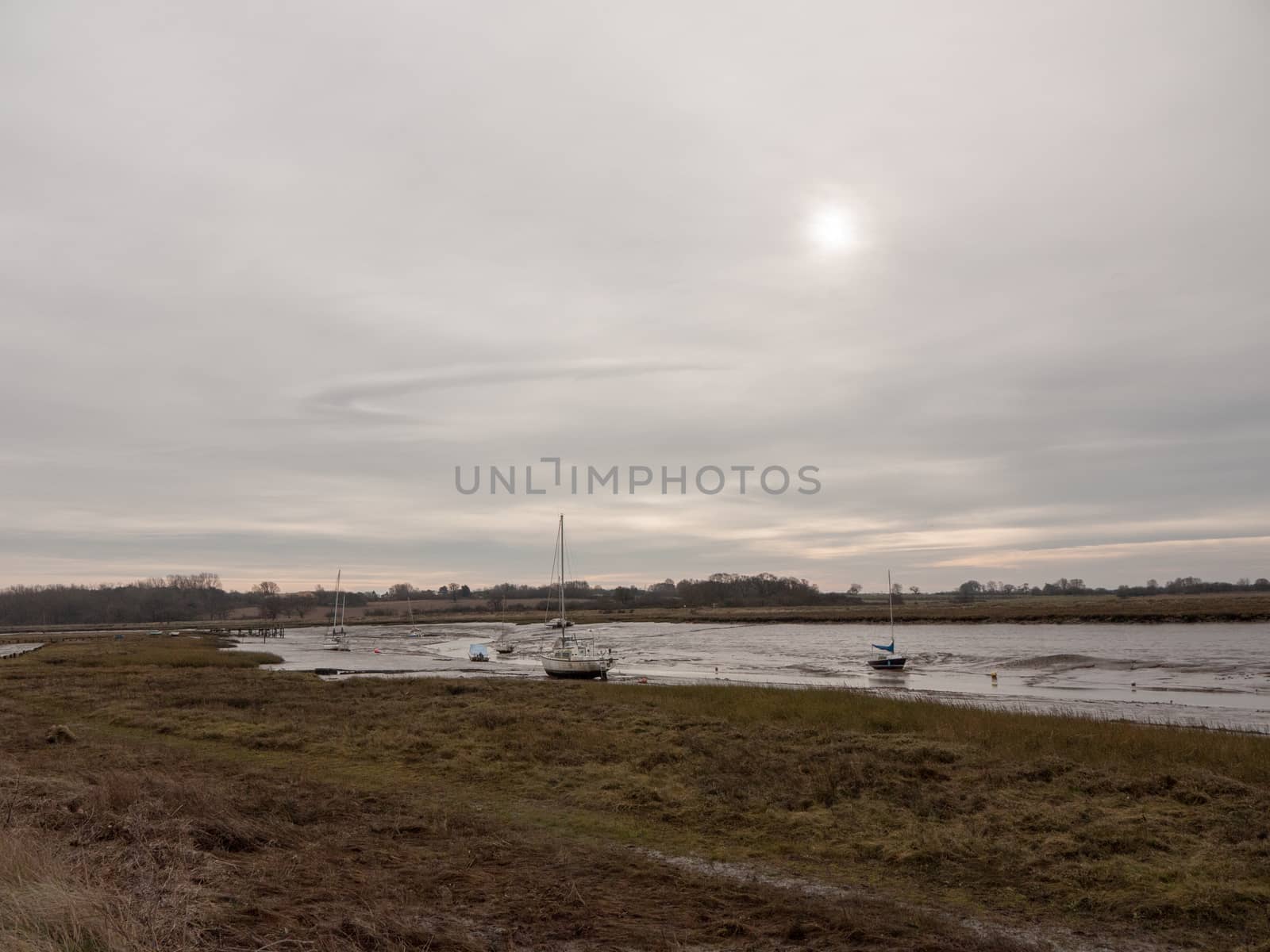 autumn winter dark cloudy overcast harbour scene estuary; essex; england; uk