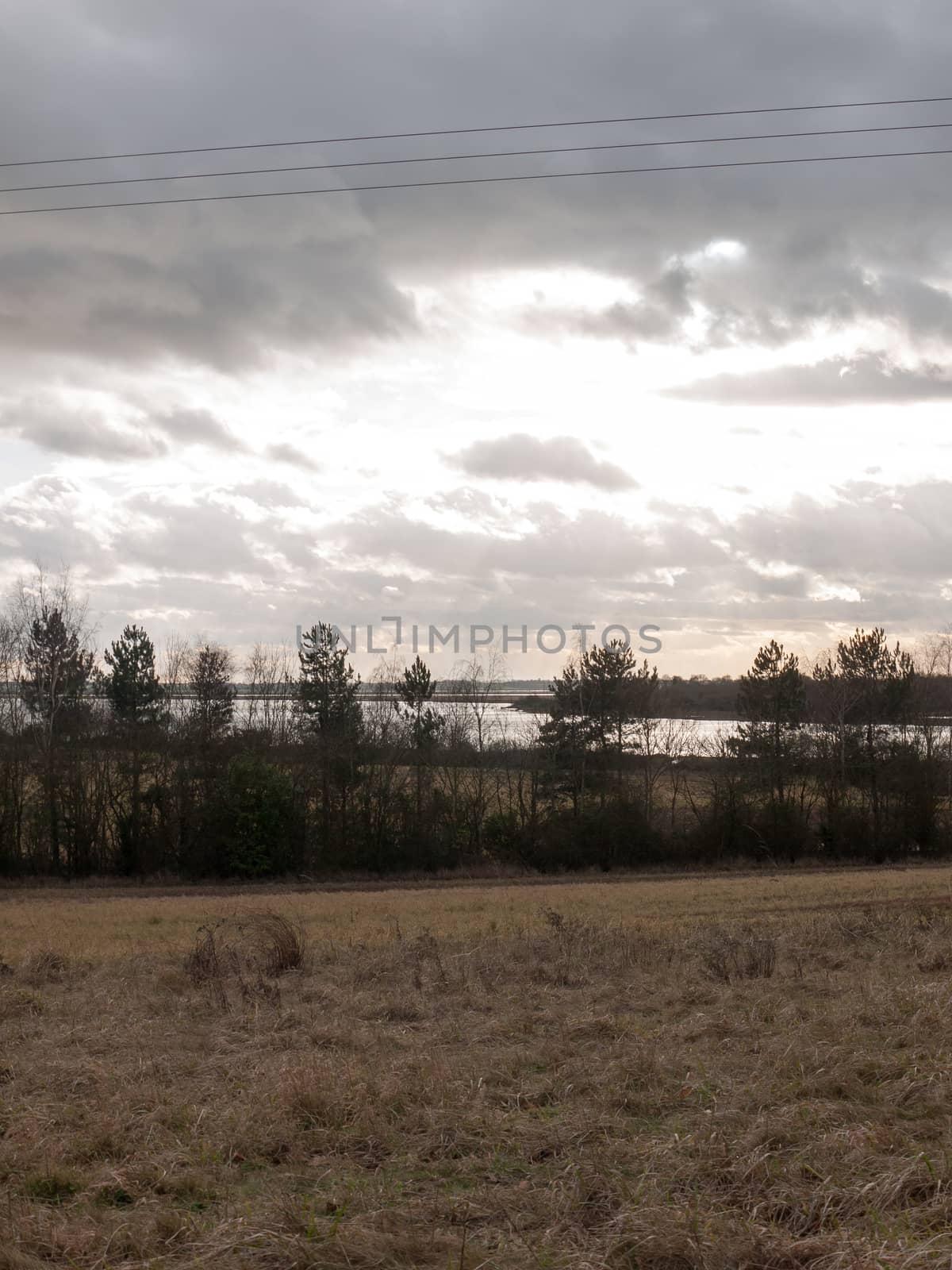 moody skyline clouds over autumn farm field ; essex; england; uk