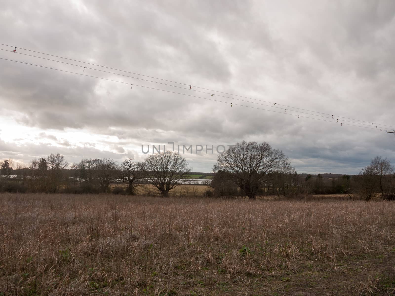 moody skyline clouds over autumn farm field ; essex; england; uk