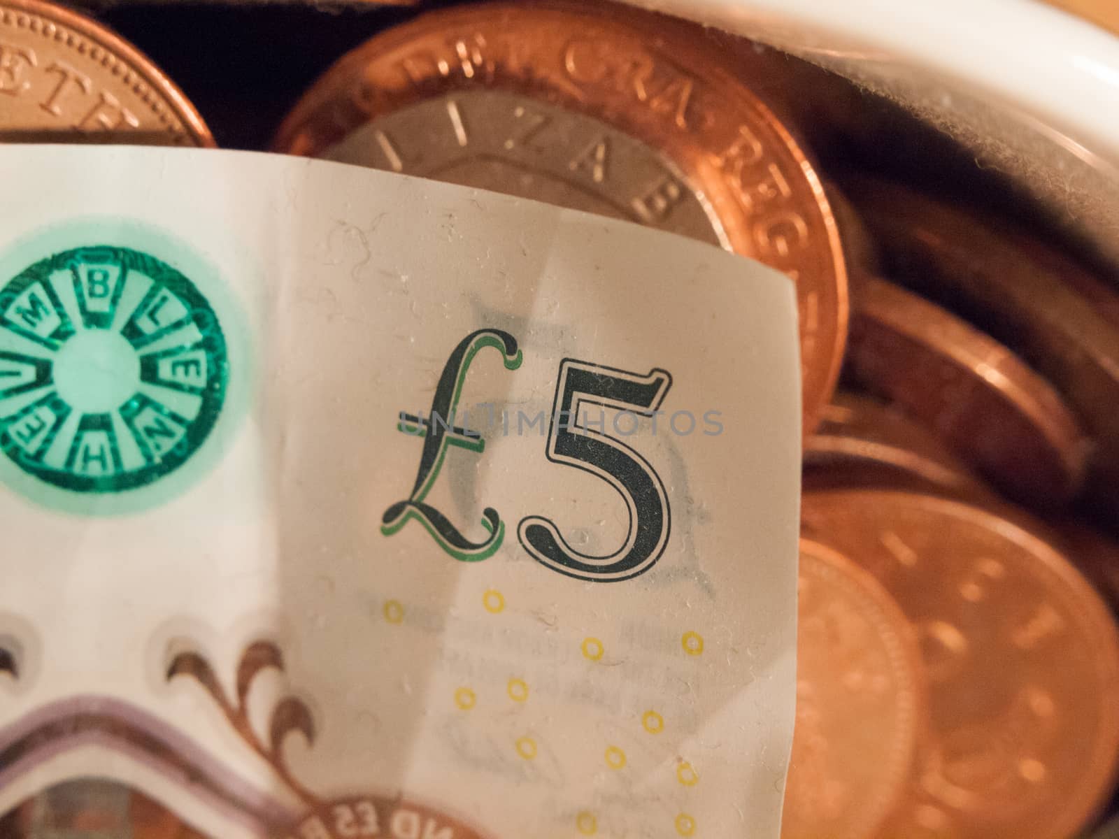 close up 5 note edge uk money sterling; essex; england; uk