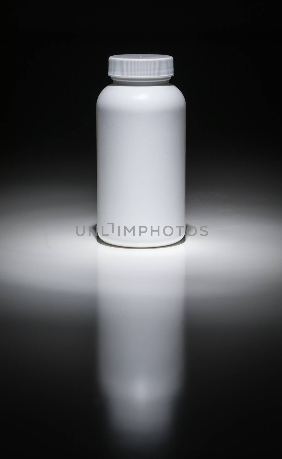 Blank White Bottle Ready For Your Text Under Spot Light.