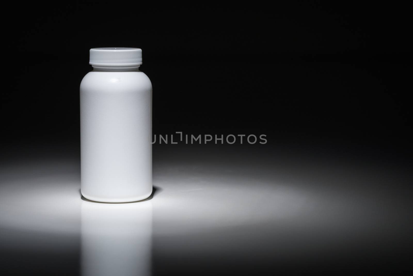 Blank White Bottle Ready For Your Text Under Spot Light. by Feverpitched