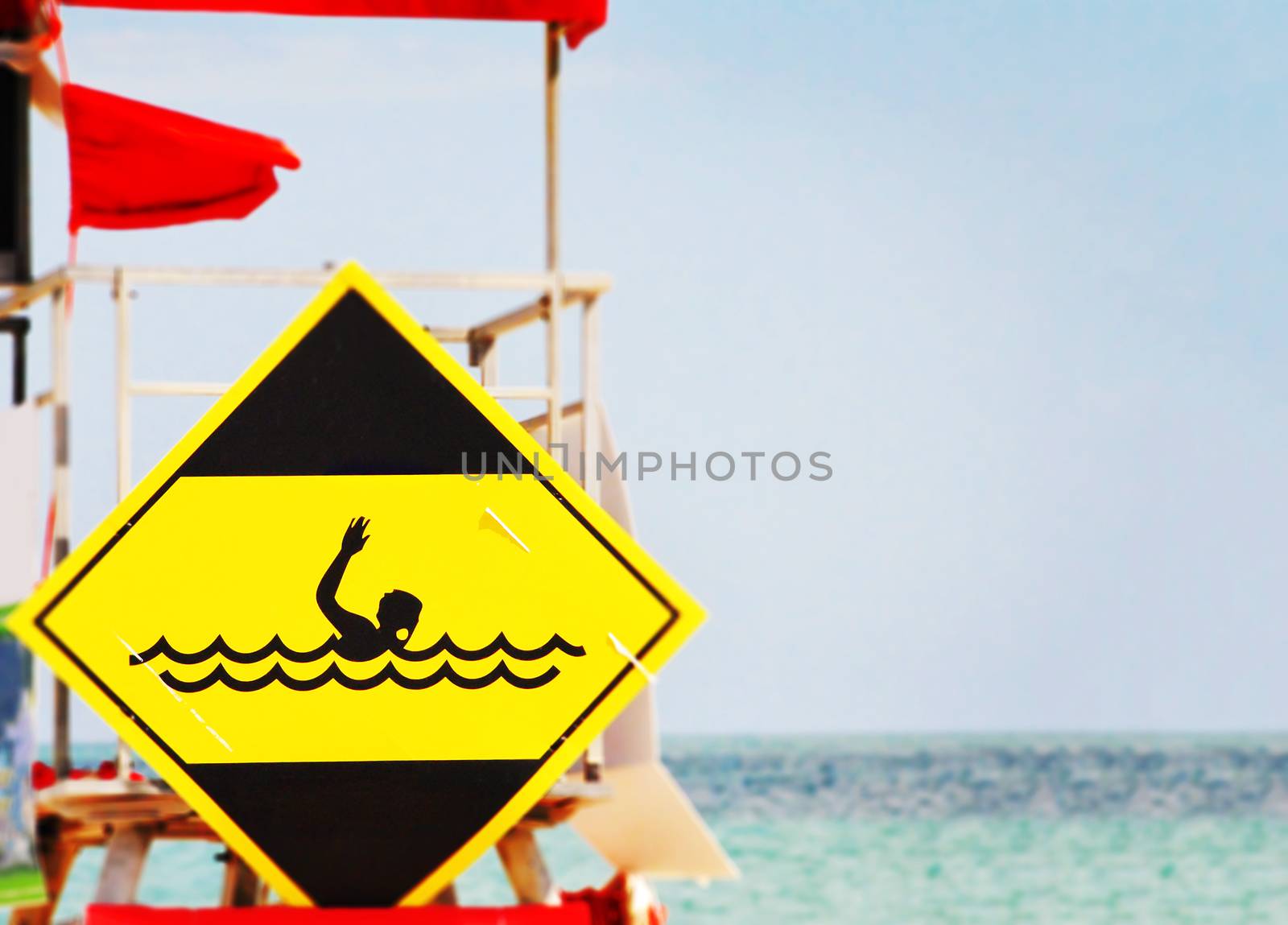 yellow danger signal depicting a drowning swimmer by rarrarorro