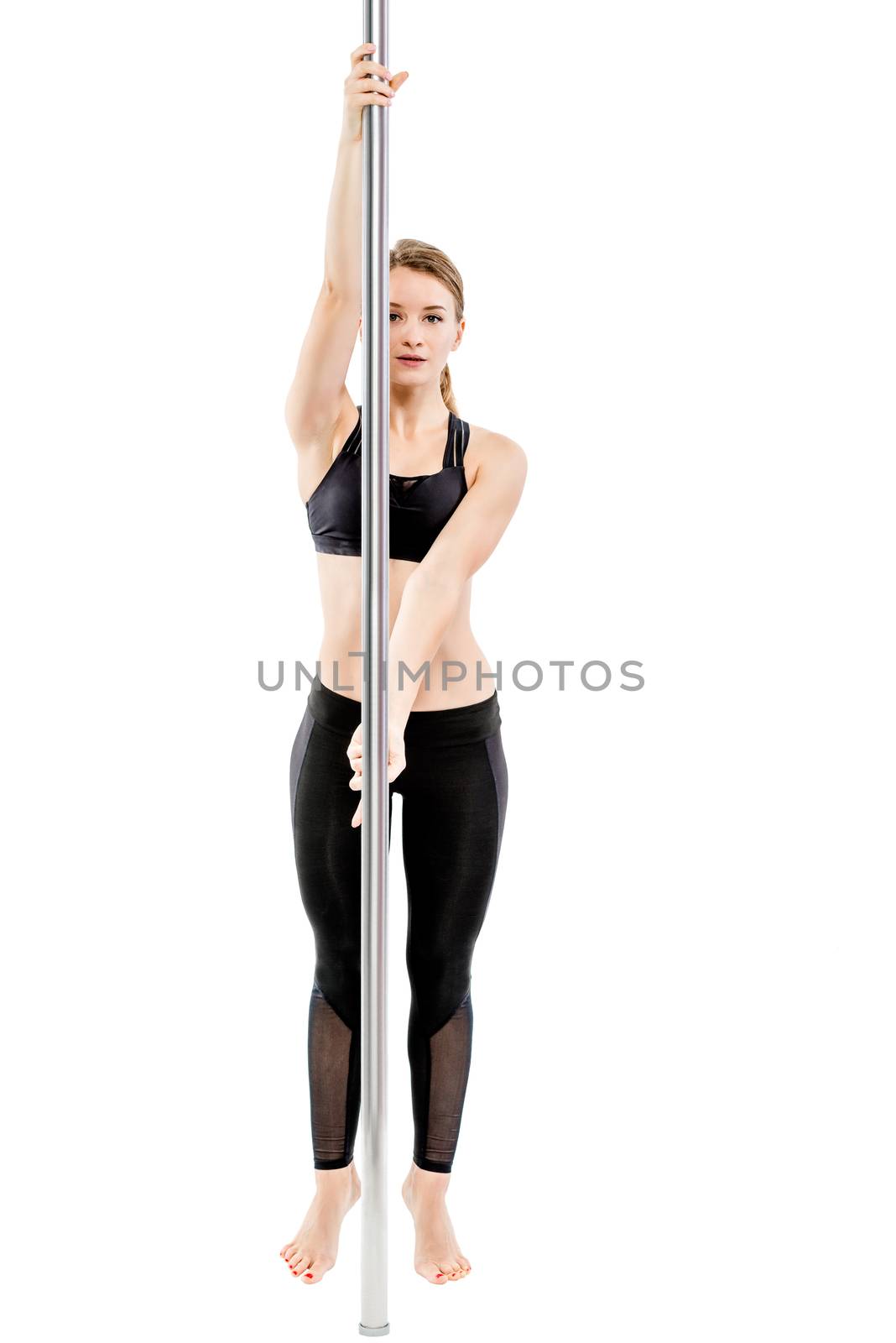 athlete at the pylon prepares for exercise on a white background