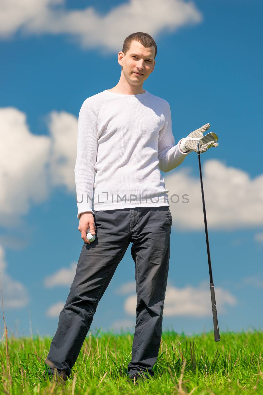 portrait of a man playing golf on the field on a sunny day by kosmsos111