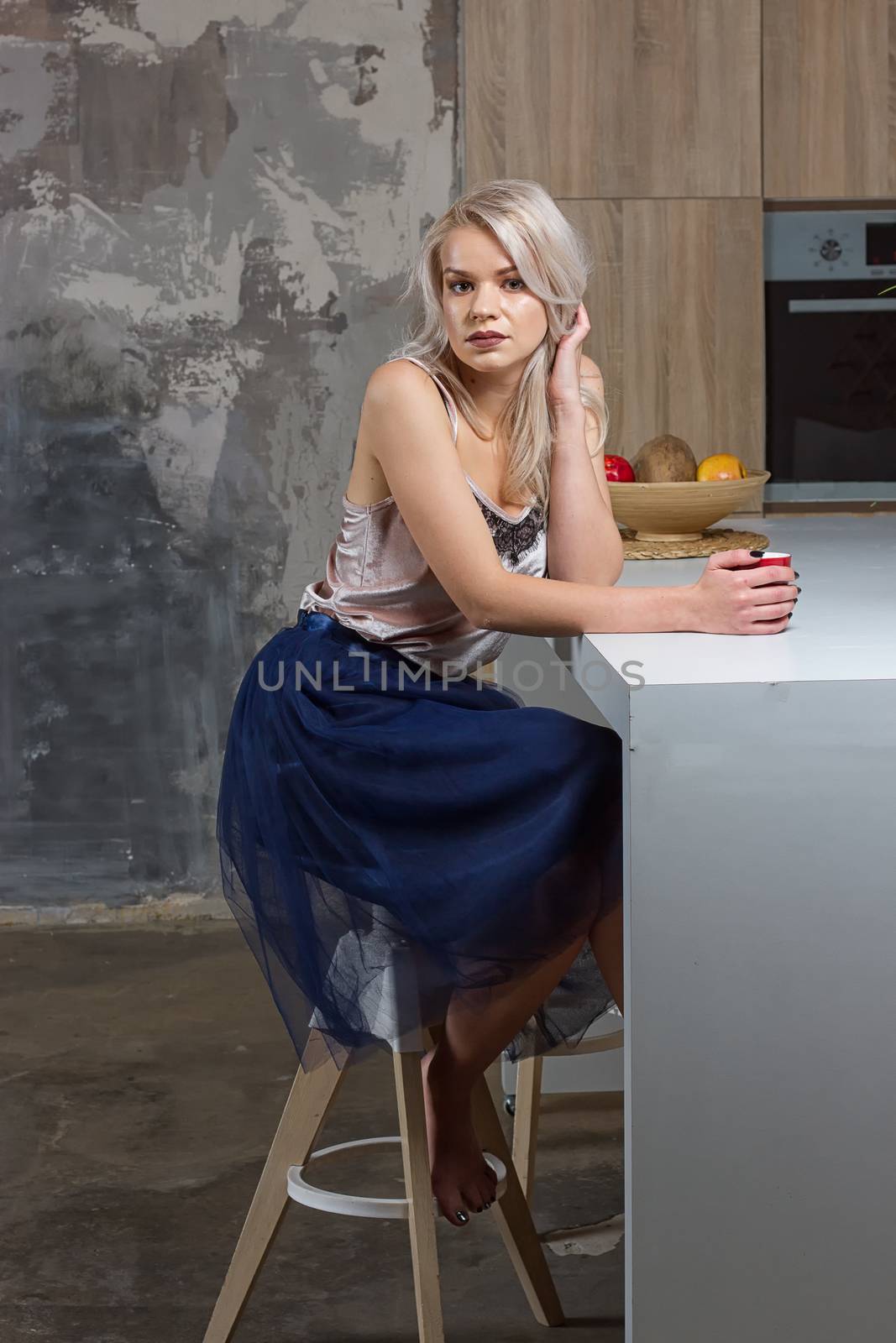 woman drinking coffee in the morning at home