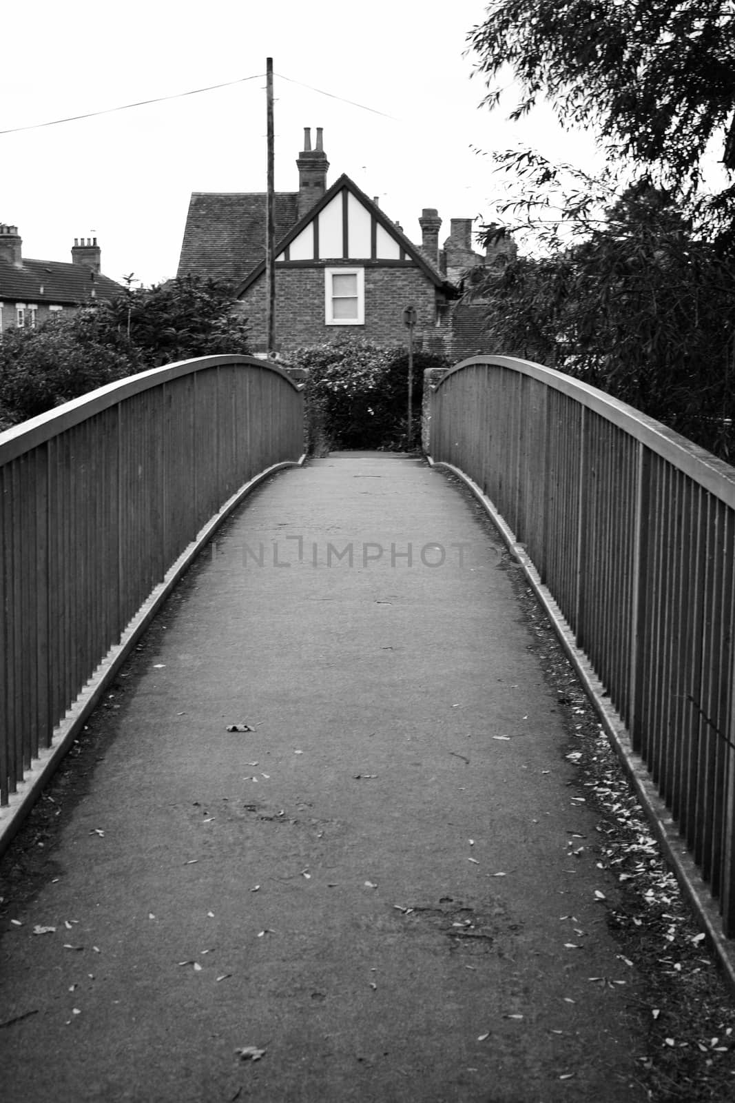 Black and white scene with old bridge in Newport Pagnell Town Centre.