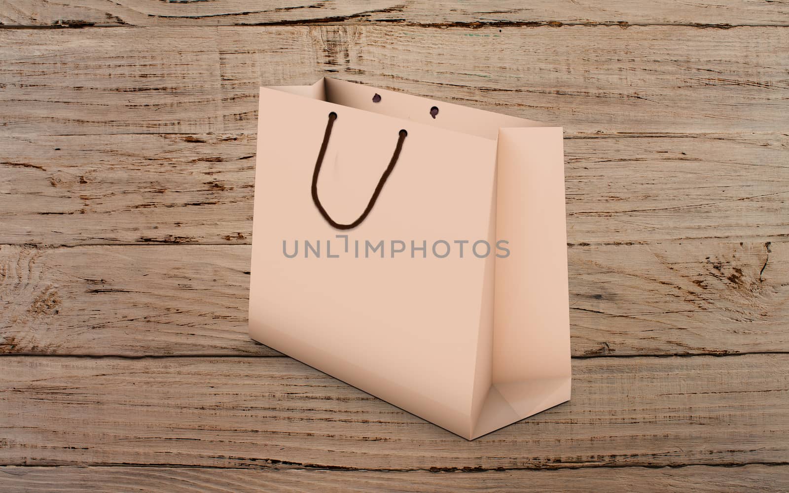 paper bag for shopping on a wooden background by boys1983@mail.ru