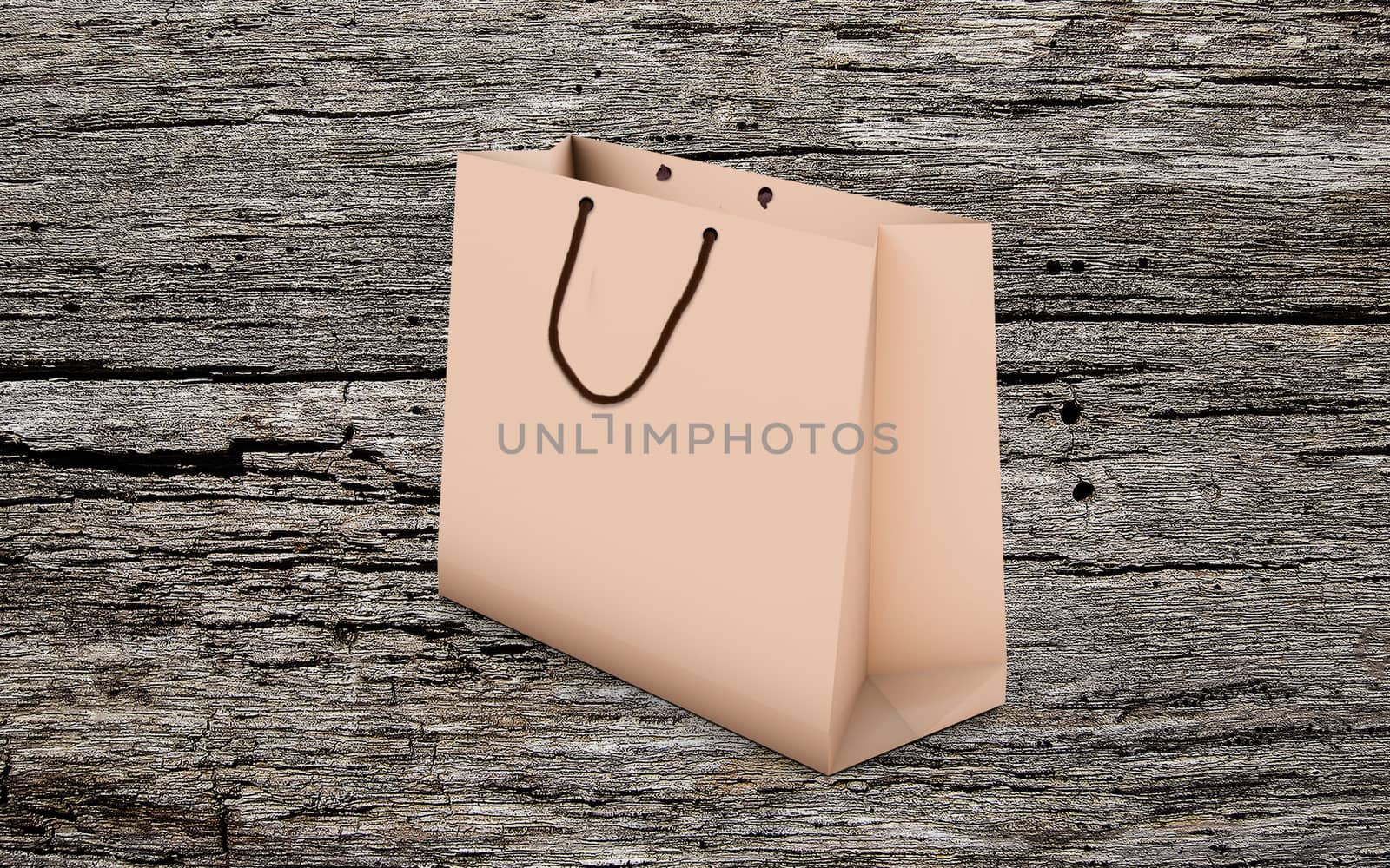 paper bag for shopping on a wooden background