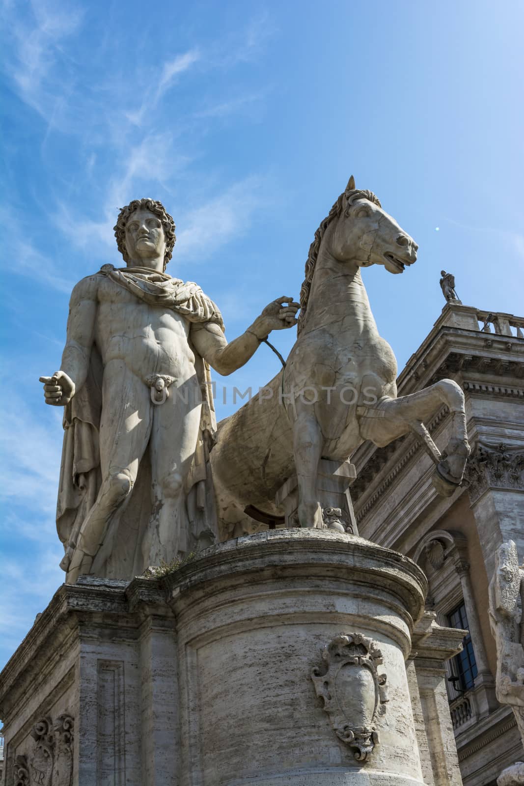 Marble statues of the Dioscuri, Castor and Pollux on the top of Capitoline Hill and Piazza del Campidoglio, Rome, Italy. by ankarb