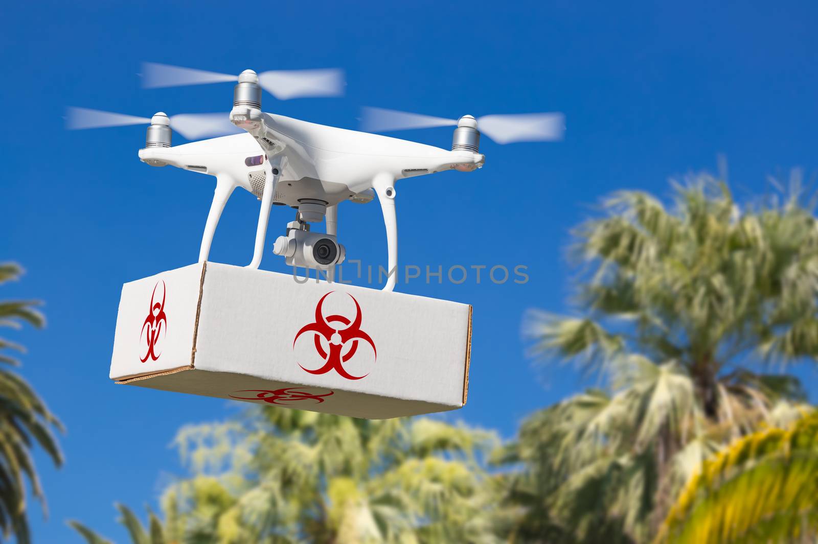 Unmanned Aircraft System (UAV) Quadcopter Drone Carrying Package With Biohazard Symbol Label Over Tropical Terrain. by Feverpitched