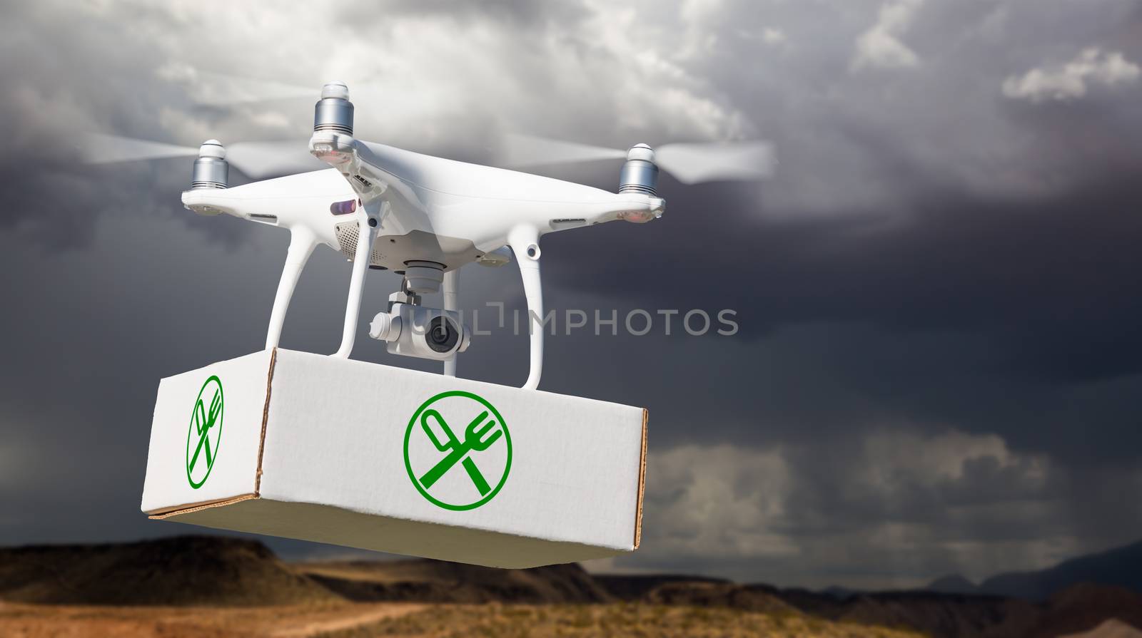 Unmanned Aircraft System (UAV) Quadcopter Drone Carrying Package With Food Symbol Label Near Stormy Skies. by Feverpitched