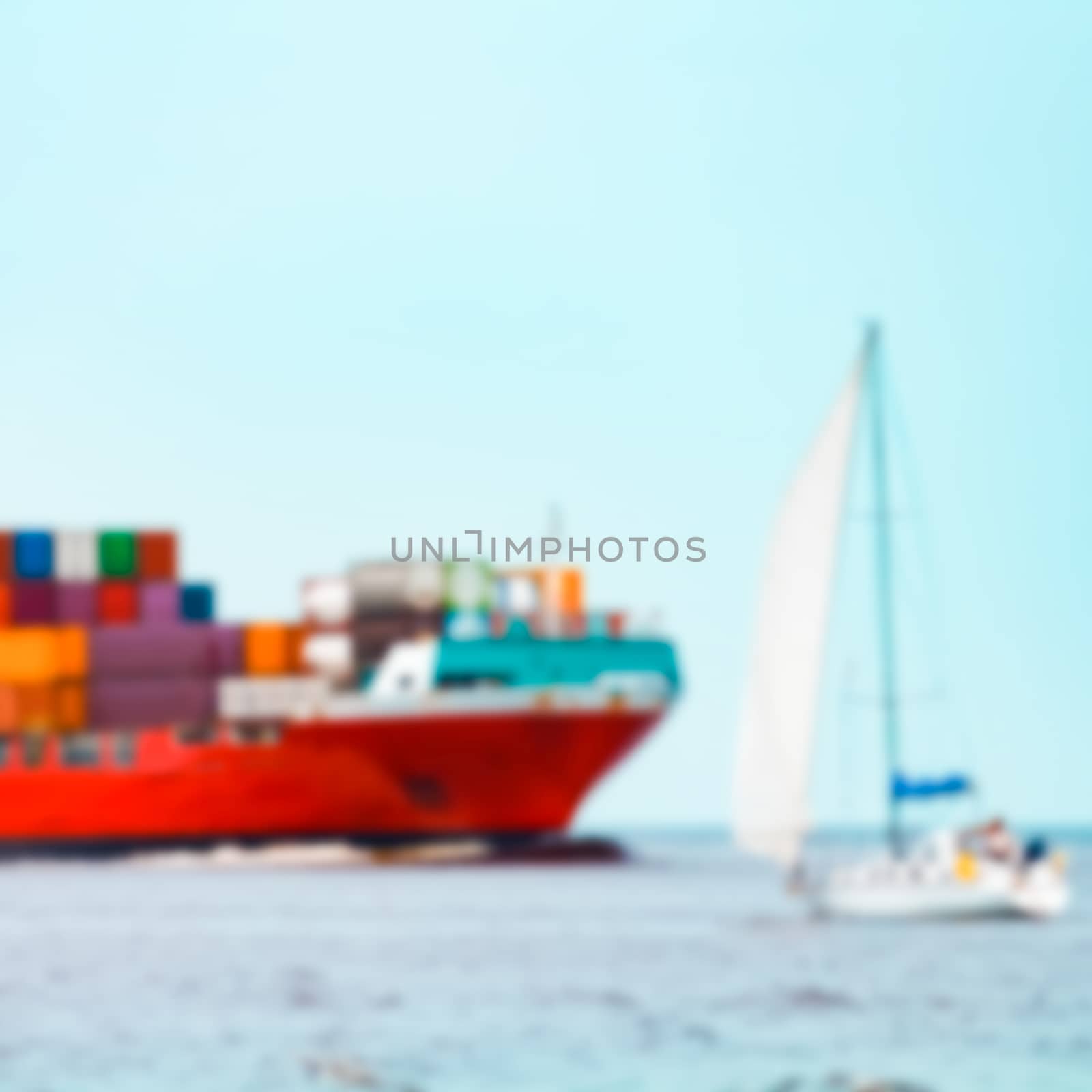 Red cargo ship - soft lens bokeh image. Defocused background