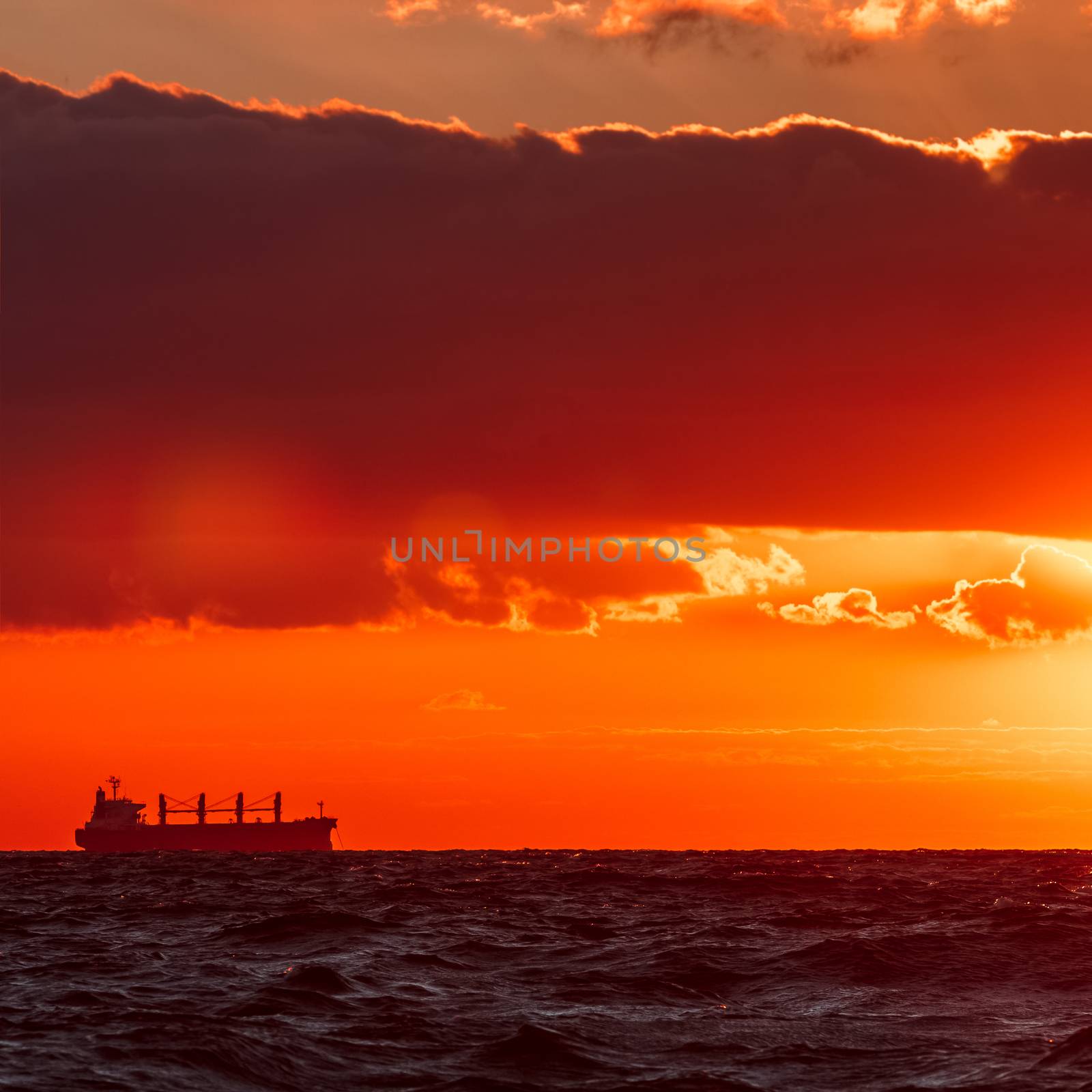 Hot and romantic sunset over the Baltic sea. Calm landscape