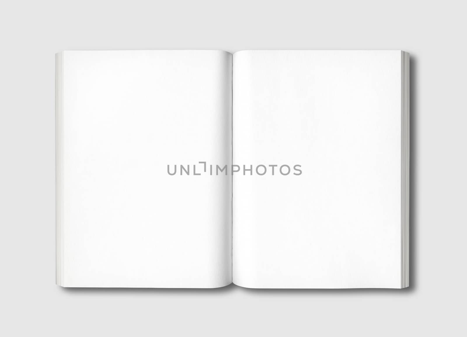 White open book isolated on a grey background