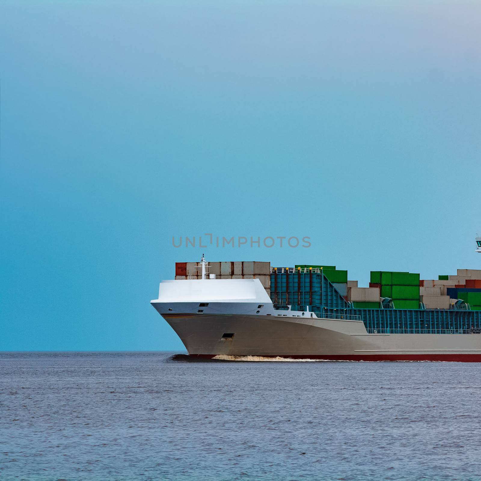 Grey container ship. Logistics and production import