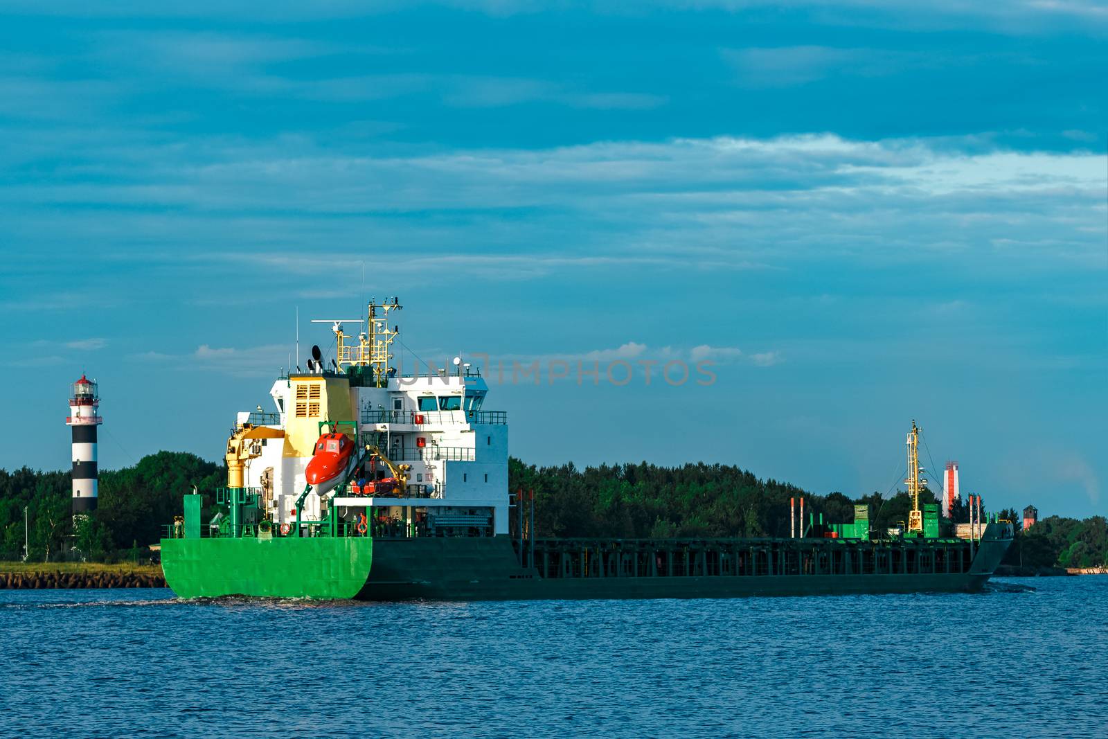 Green bulker ship. Logistics and merchandise transportations