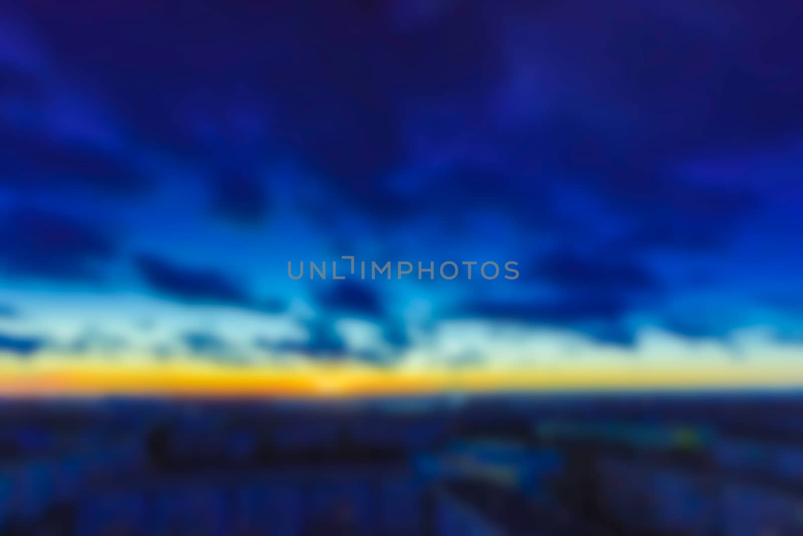 Sky clouds - soft lens bokeh image. Defocused background