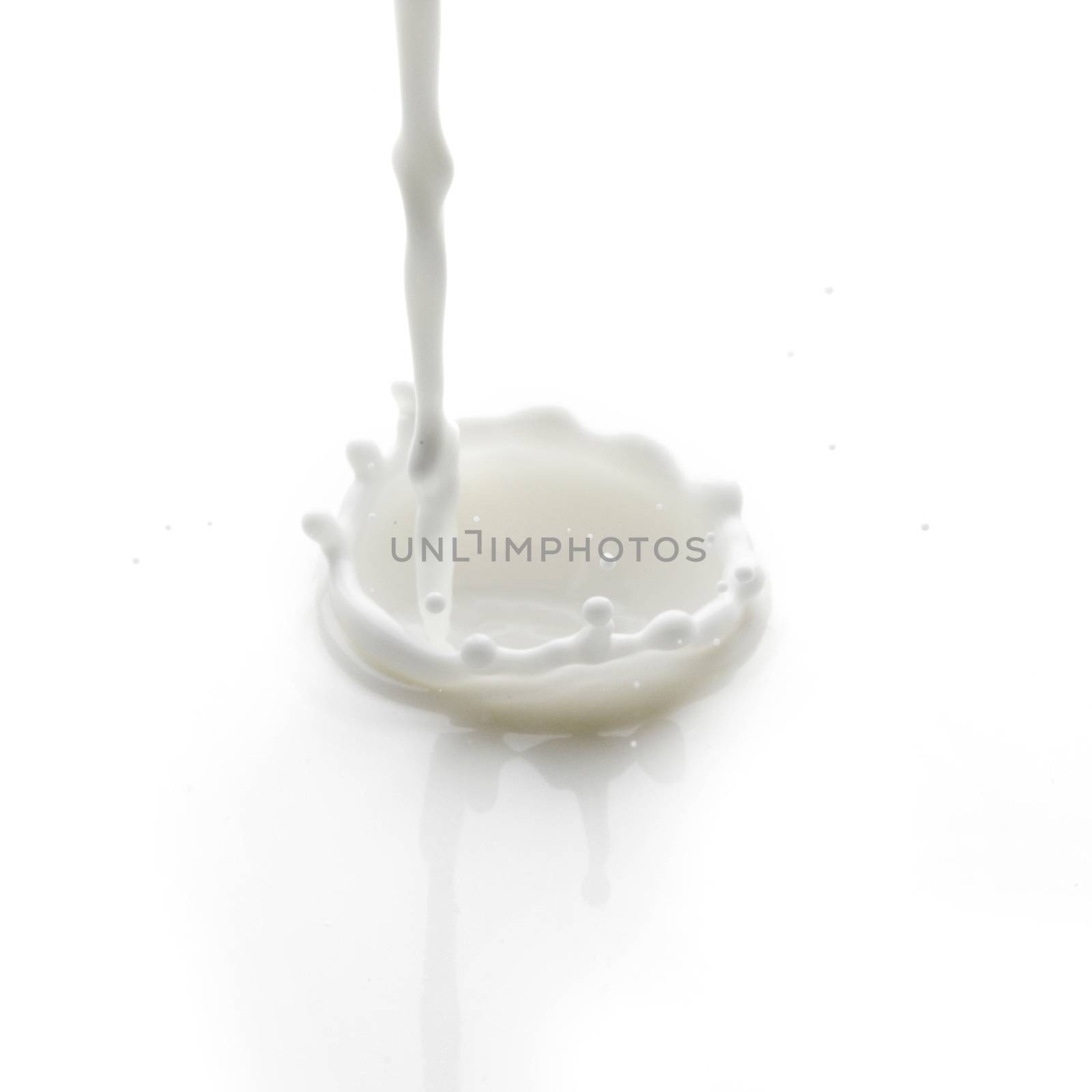 Pouring milk splash by Yellowj