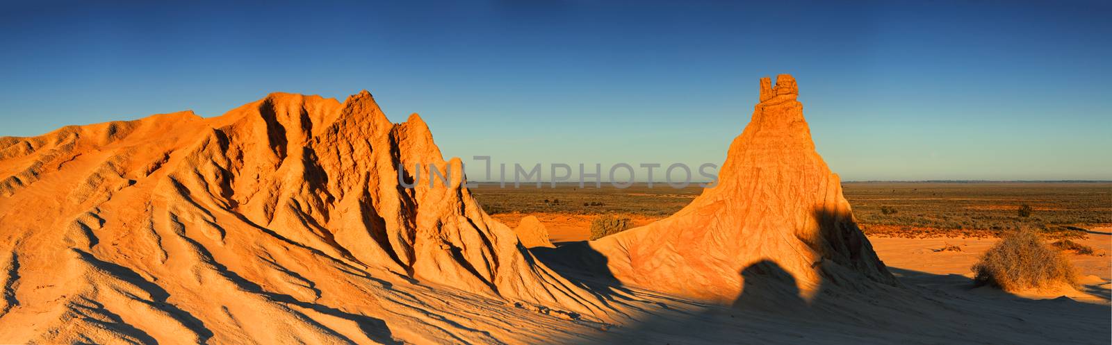 Inland Australia desert landscape in late afternoon winter light. Three image stitched panorama
