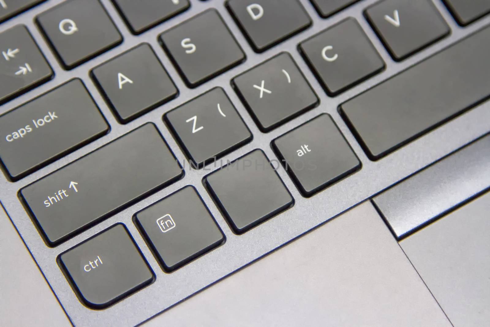 Some of the computer keys are gray-black.