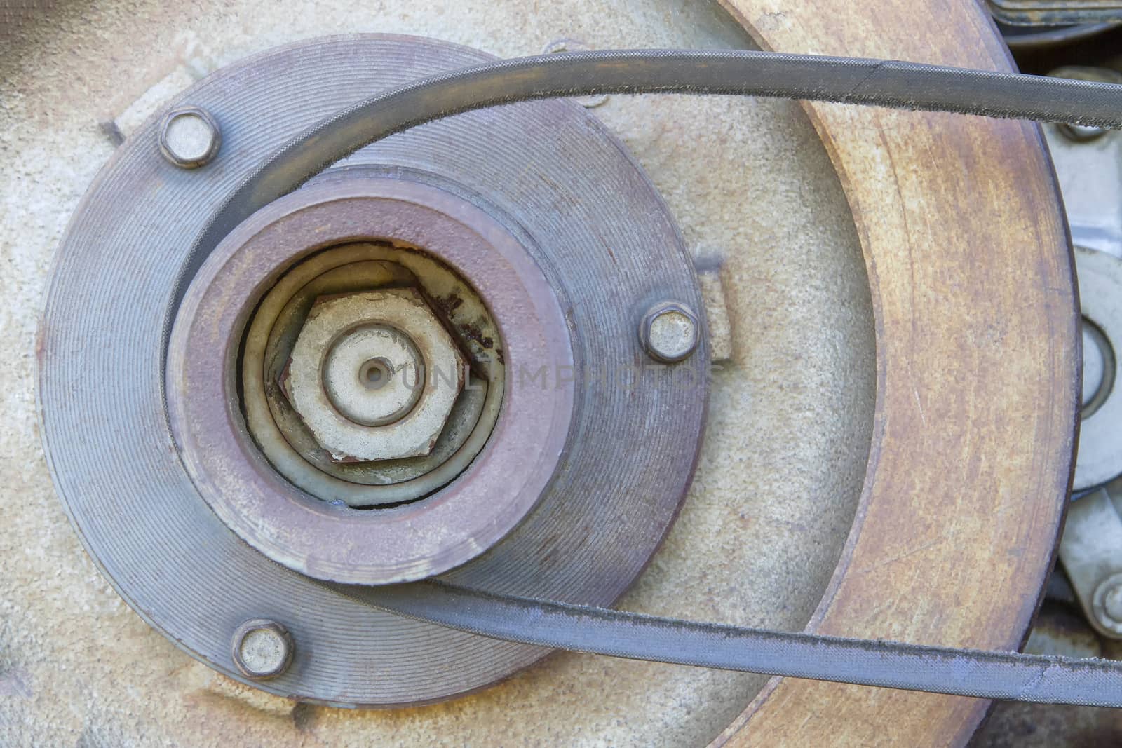 Pulley belt of a small old tractor.